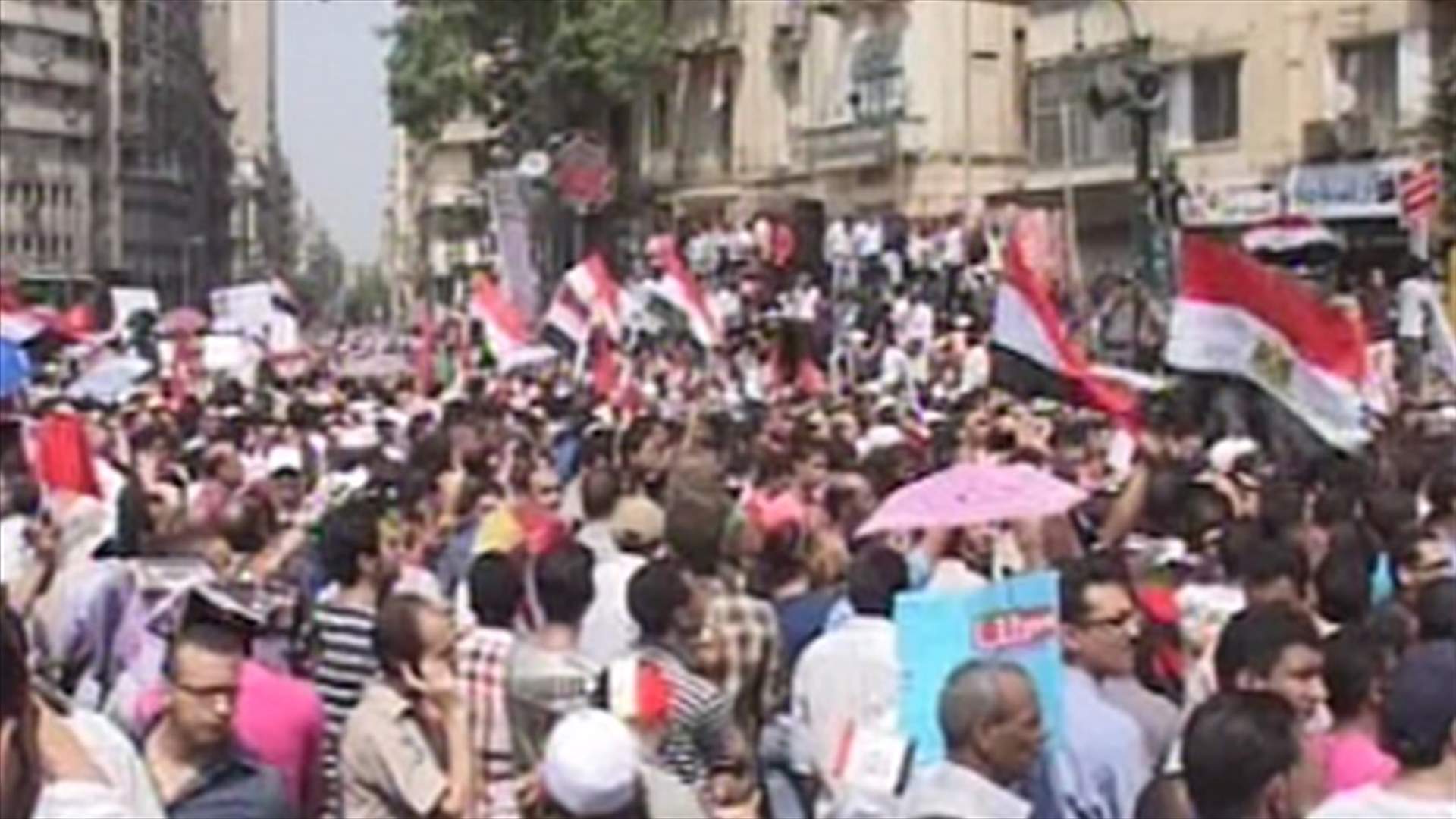 Egypt activists demolish parts of wall protecting Israel embassy