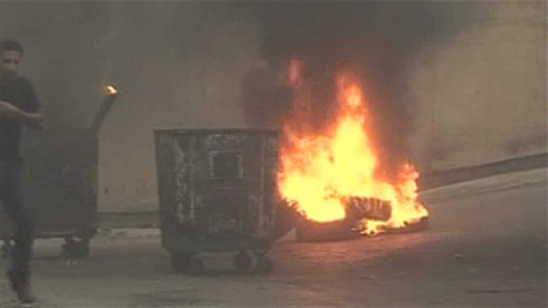 EDL contract workers burn tires at company’s entrance