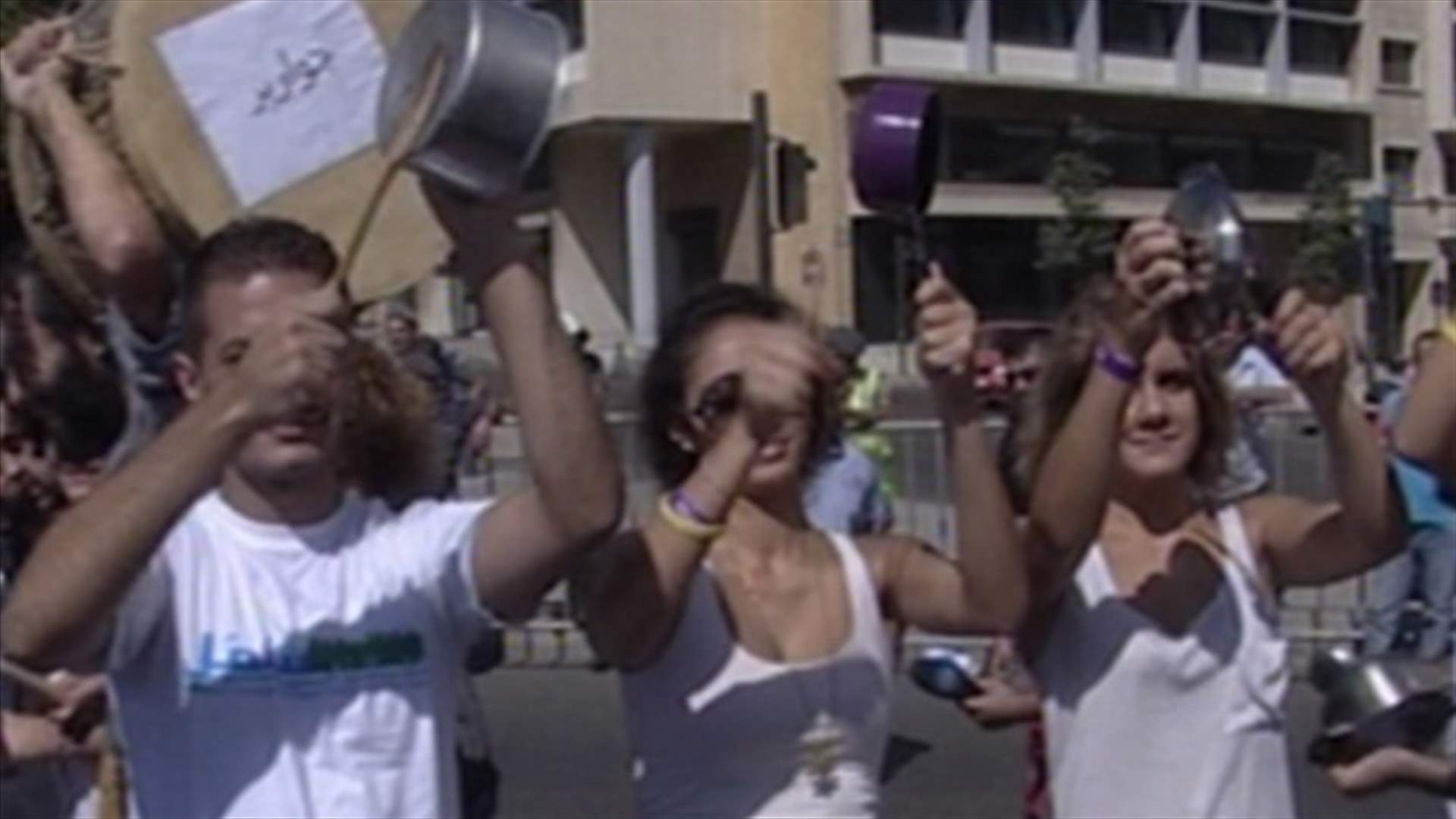 Activists gather in Riad Solh Square with their cooking pans 