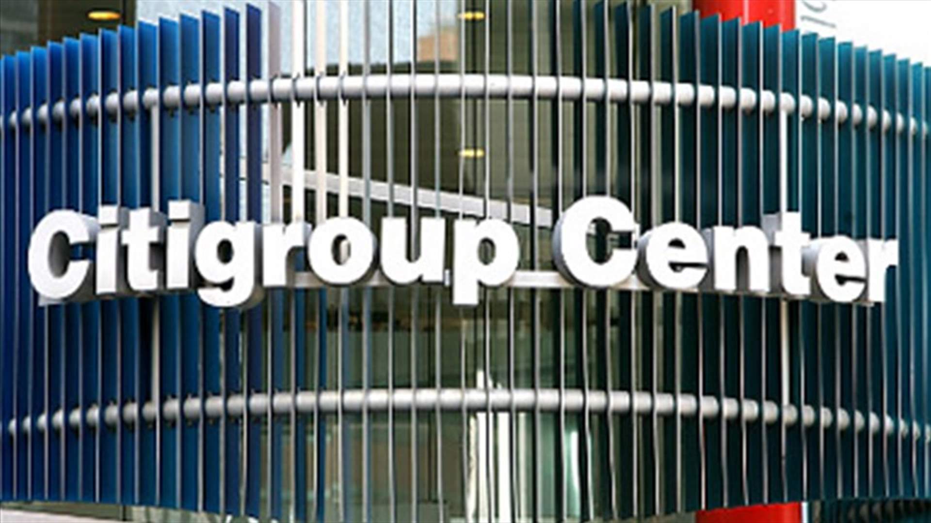 Citigroup profit drops as it writes down brokerage unit