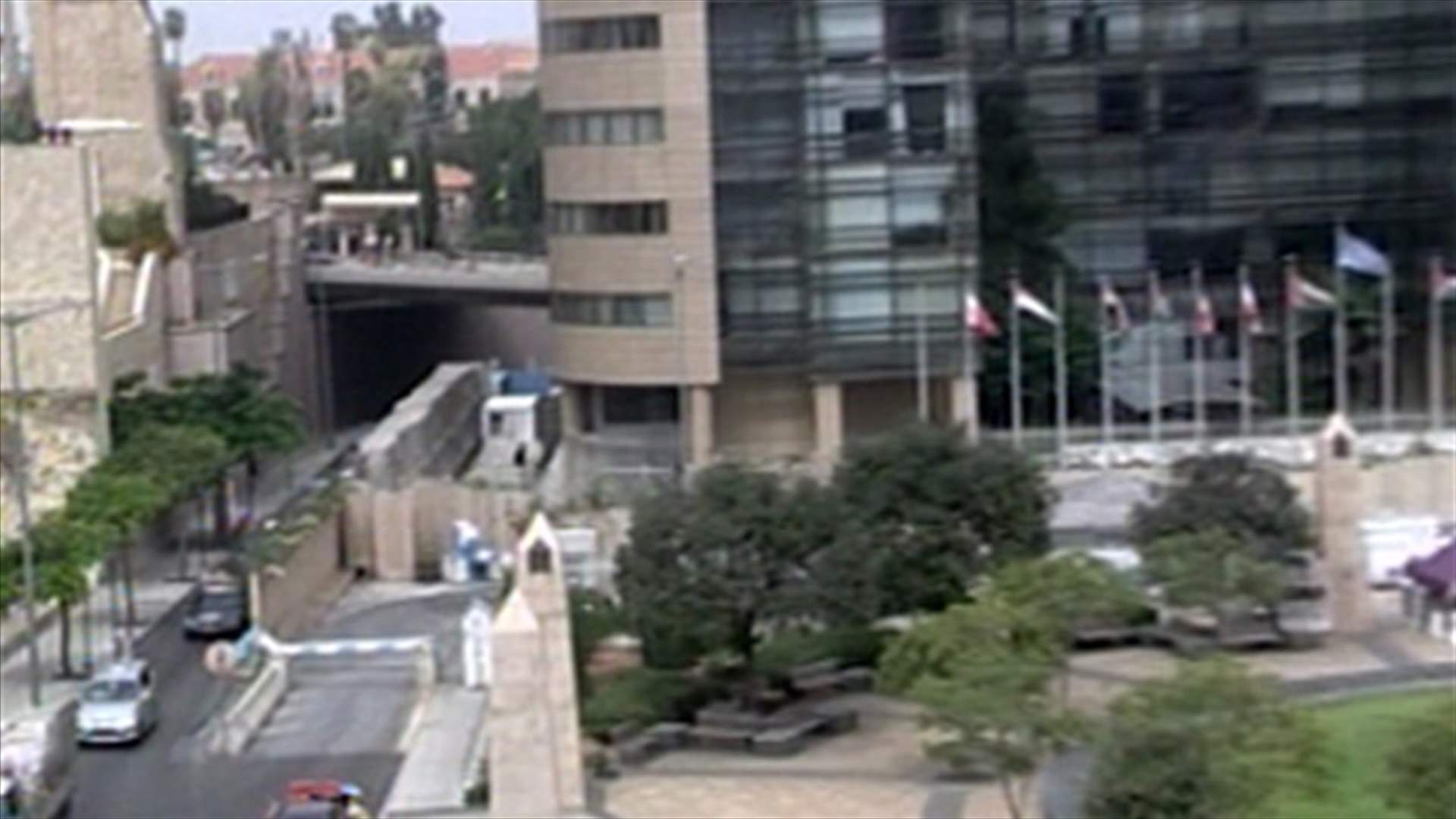 What is the background behind closing the ESCWA road? 