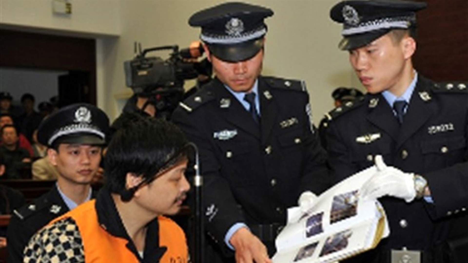 إعتقال صيني قتل 9 أشخاص بسبب غيرته على زوجته 