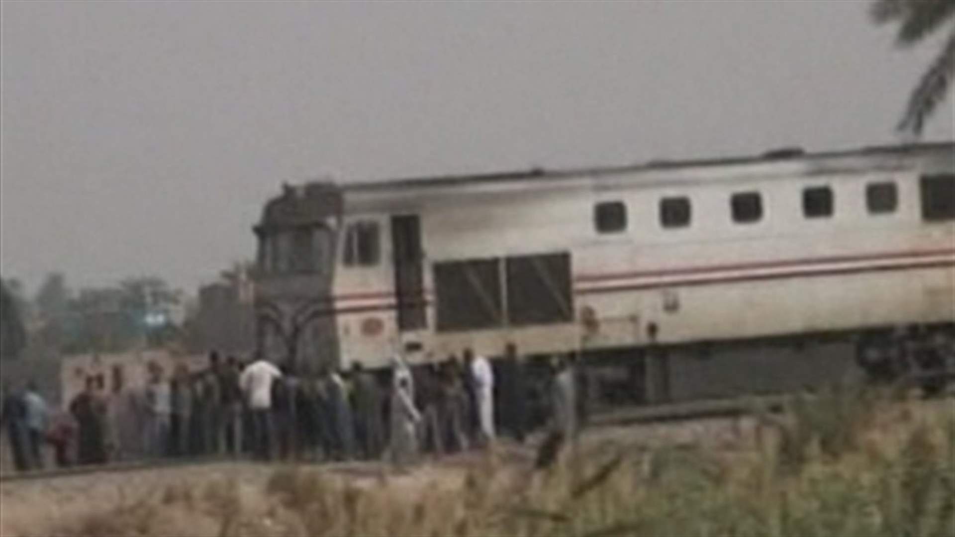 REPORT: Egypt: Train hits school bus; 49 children killed