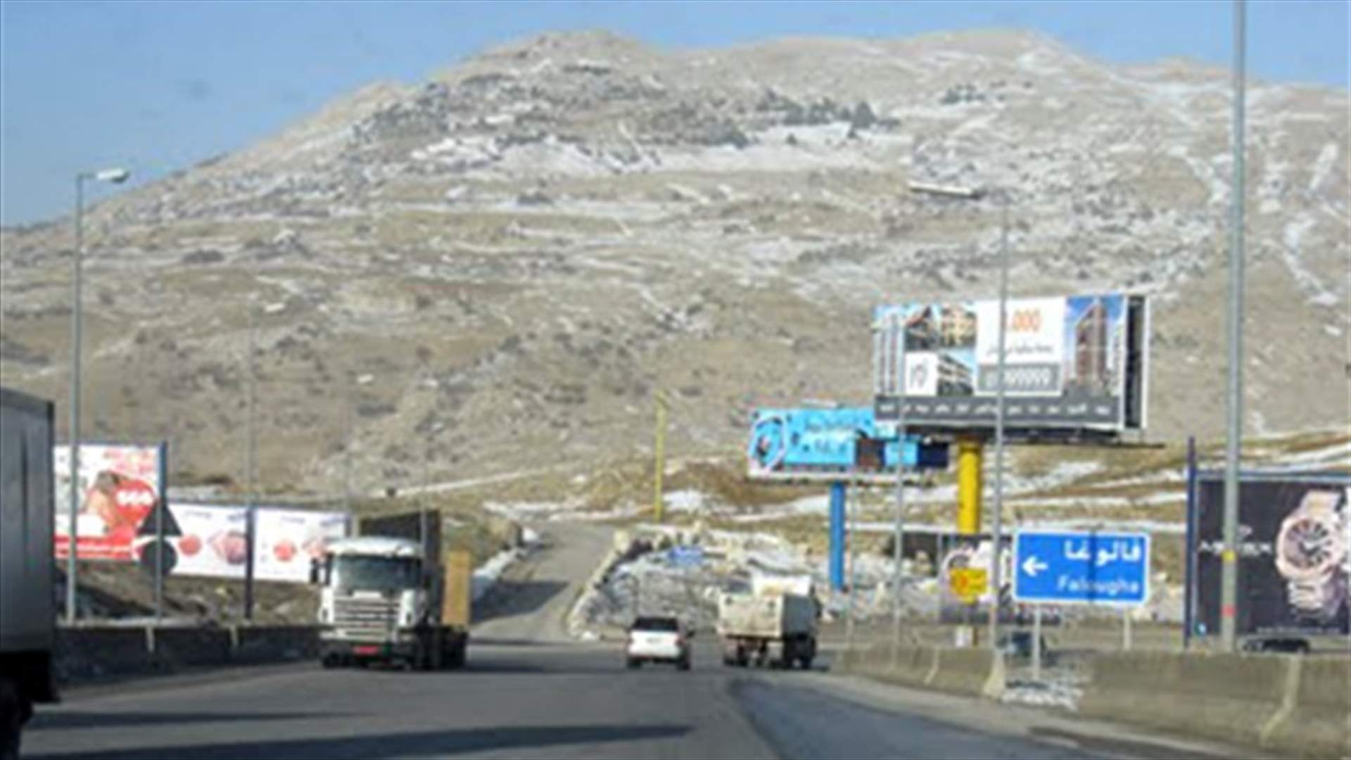 Pickup truck carrying unexploded shells pulled-over in Dahr al-Baydar