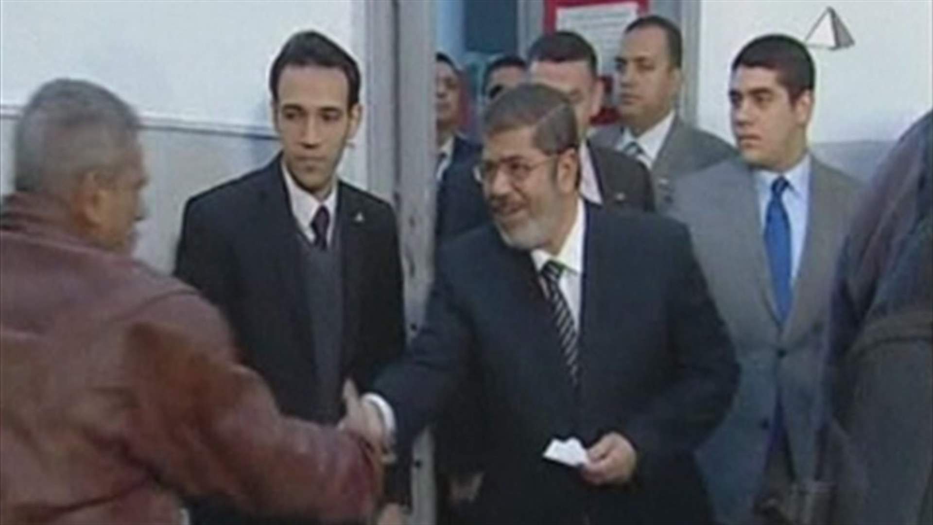 Egyptians vote on divisive constitution