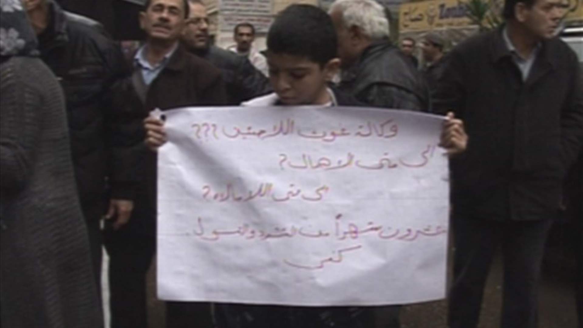 Displaced Palestinian refugees stage sit-in before the UNRWA in Beirut