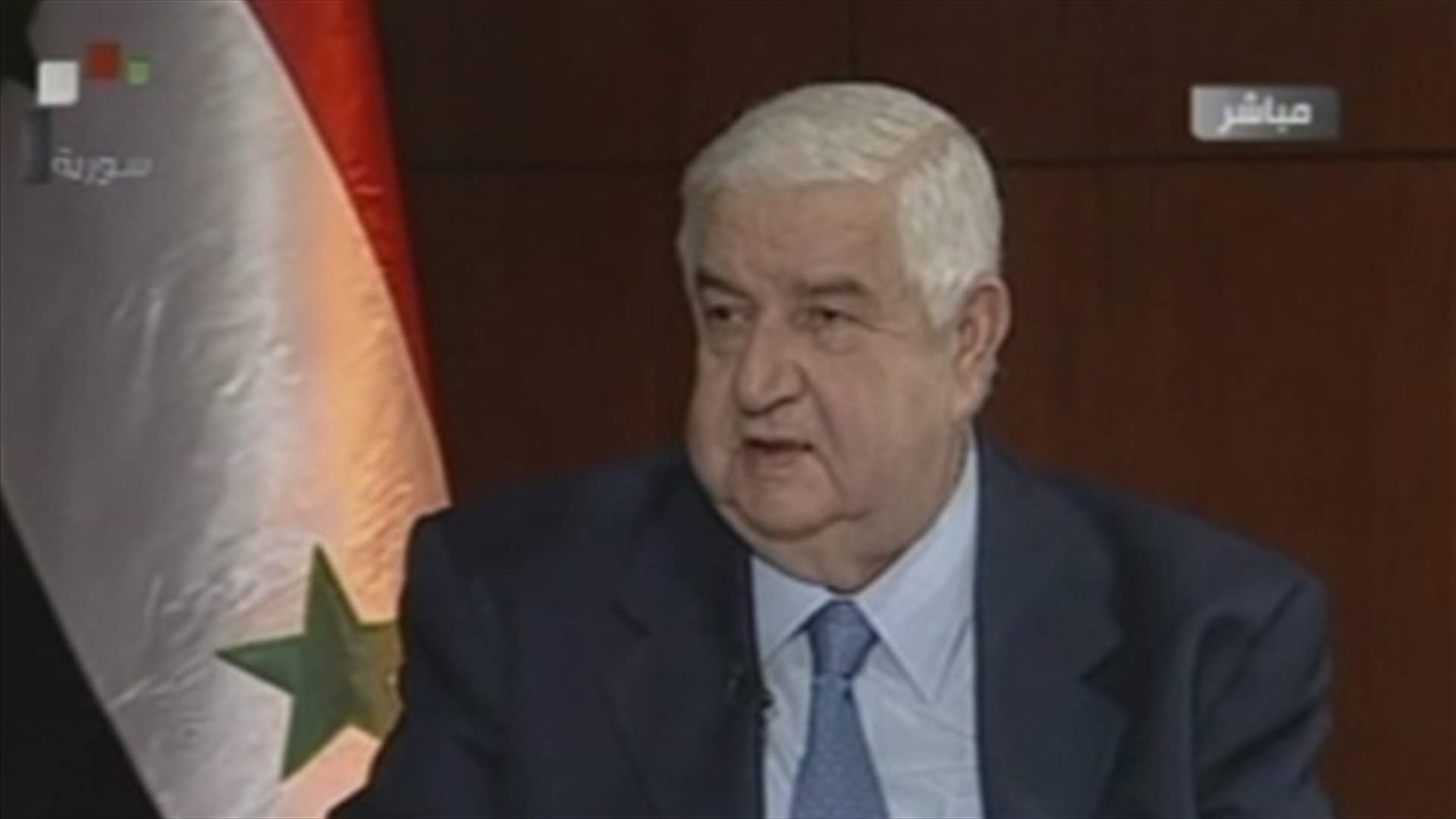 Walid al-Moualem says talk of Assad's removal unacceptable