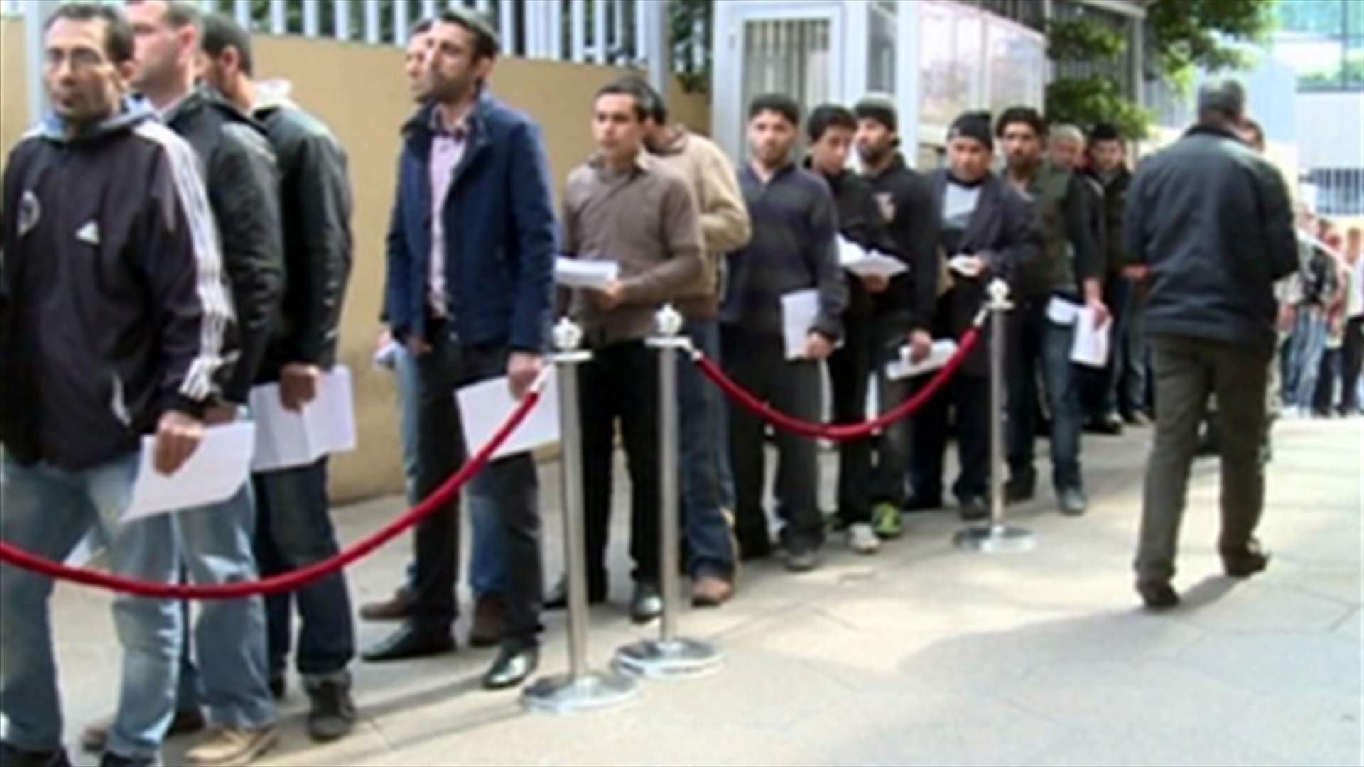 REPORT: Syrian Refugees line up outside General Security headquarters 