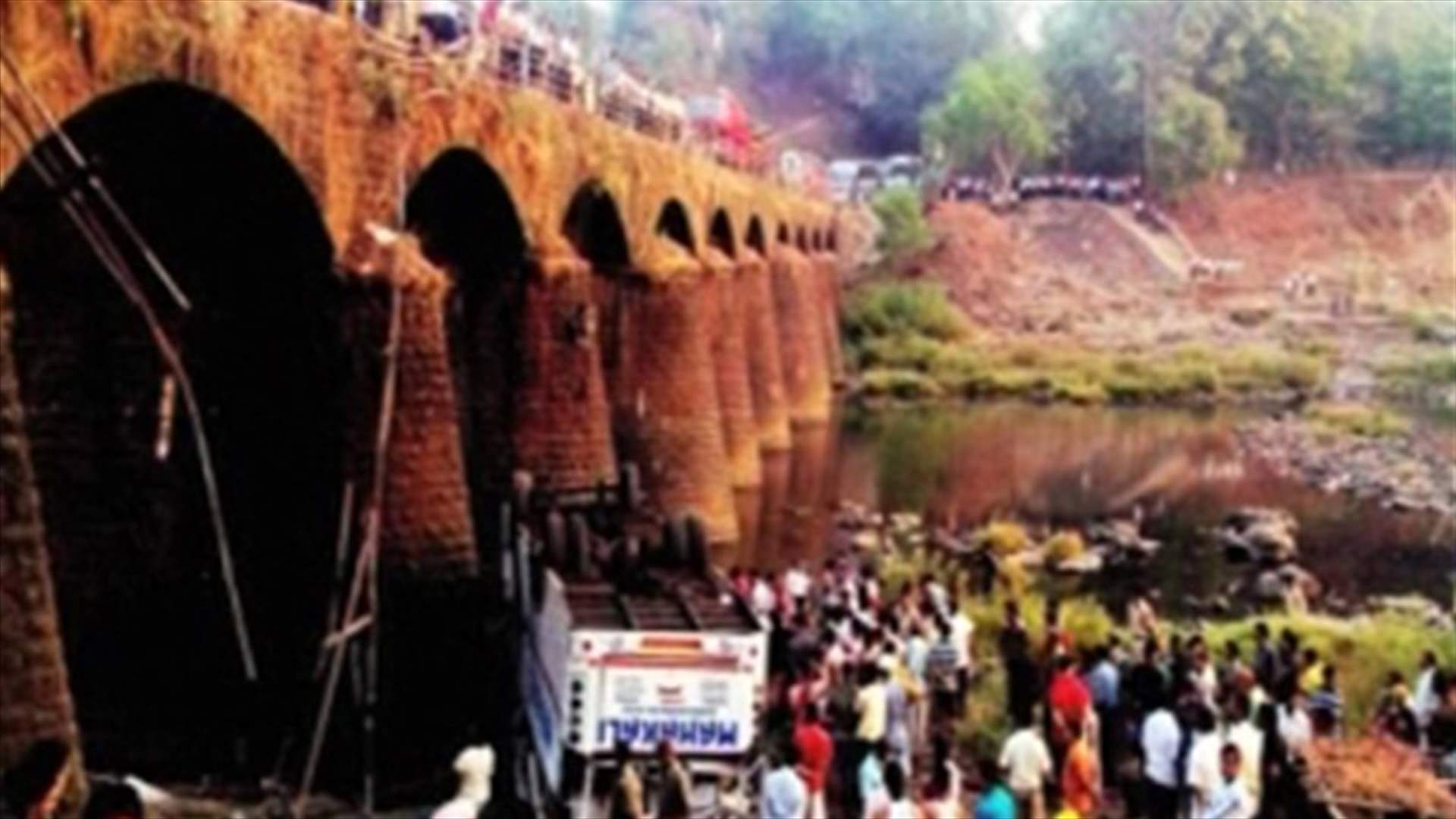 Bus falls off bridge in India, killing at least 37   