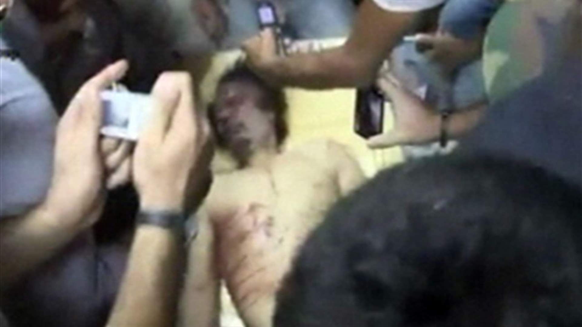 سيف الاسلام يحاول الفرار وجثة القذافي ستدفن في مكان سري 