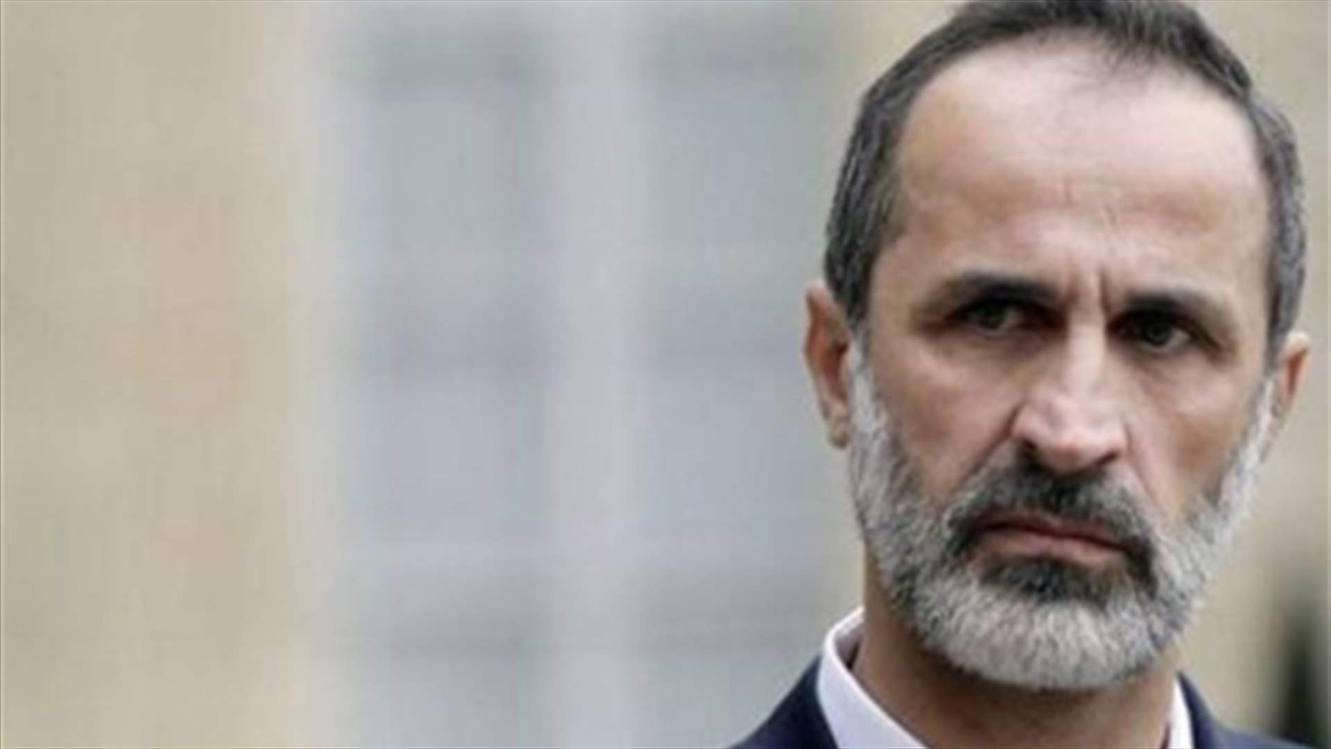 Qatar urges Syrian opposition head to reconsider resignation