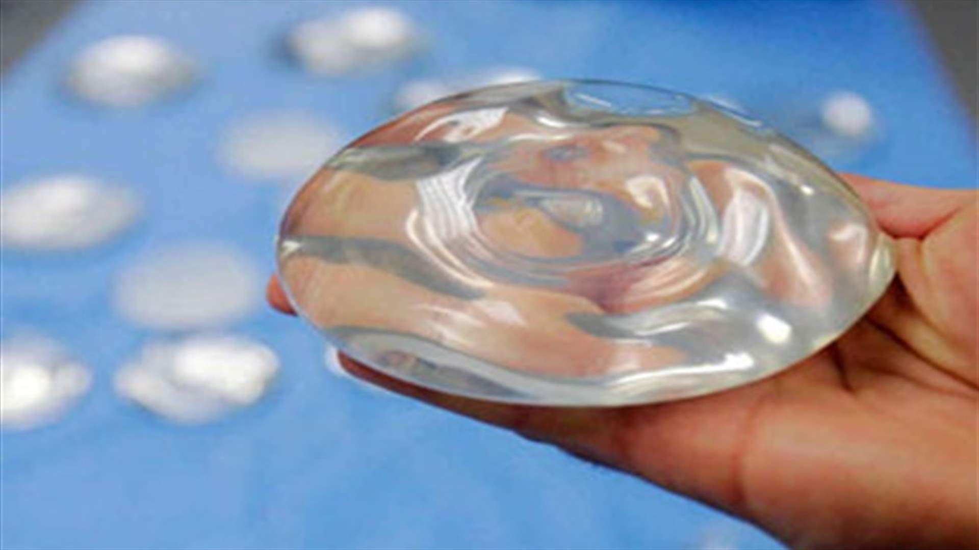 Woman steals huge sum to fund breast implants