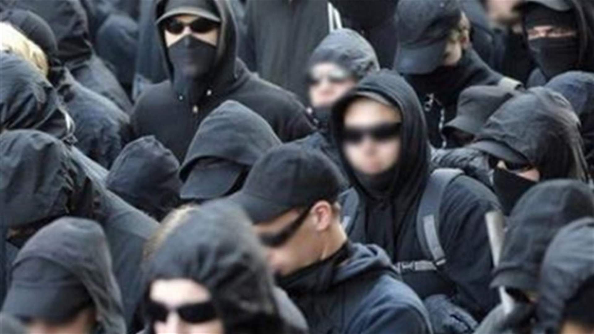 Egypt arrests 12 "Black bloc" members 