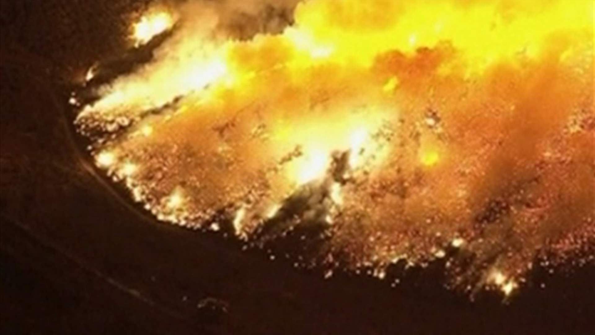 California wildfire burns path to Pacific
