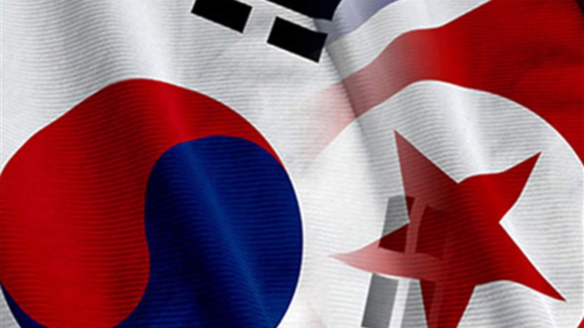 2 Koreas talk in border village after tensions