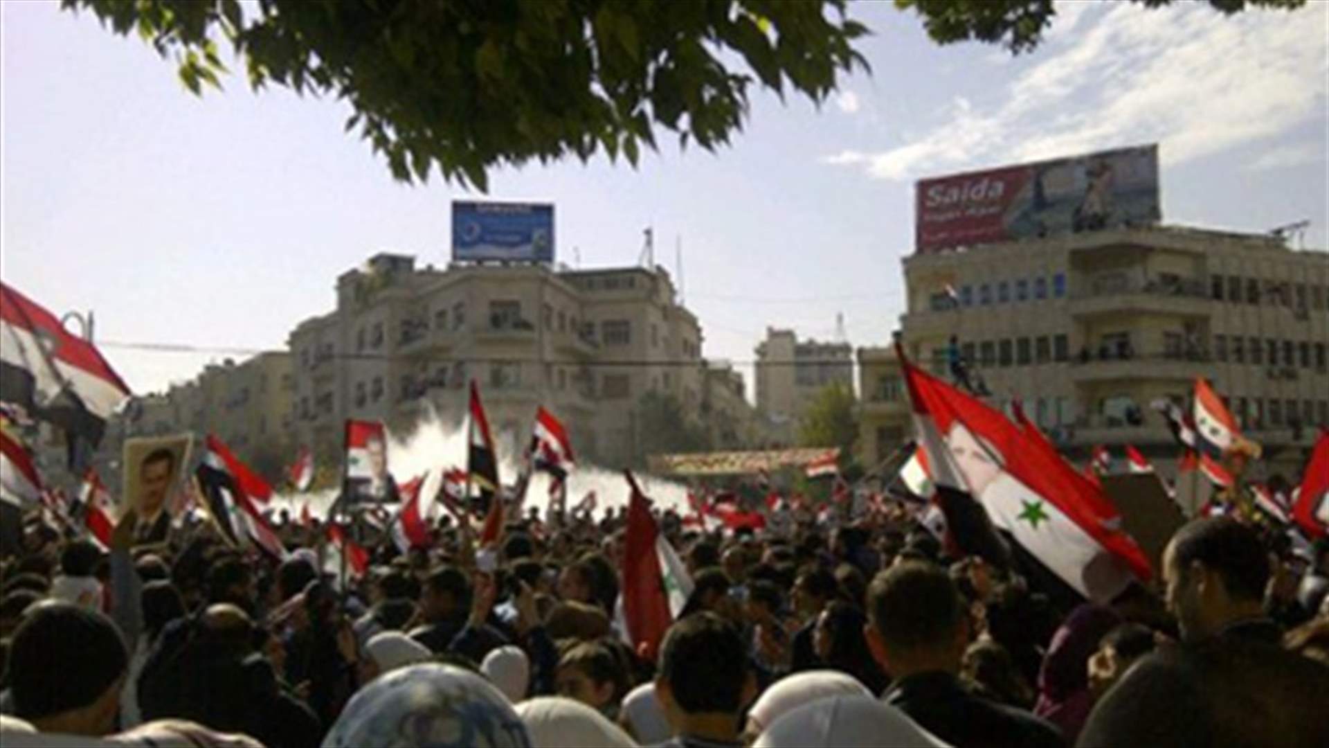 Syria calls for emergency Arab summit, 11 killed 