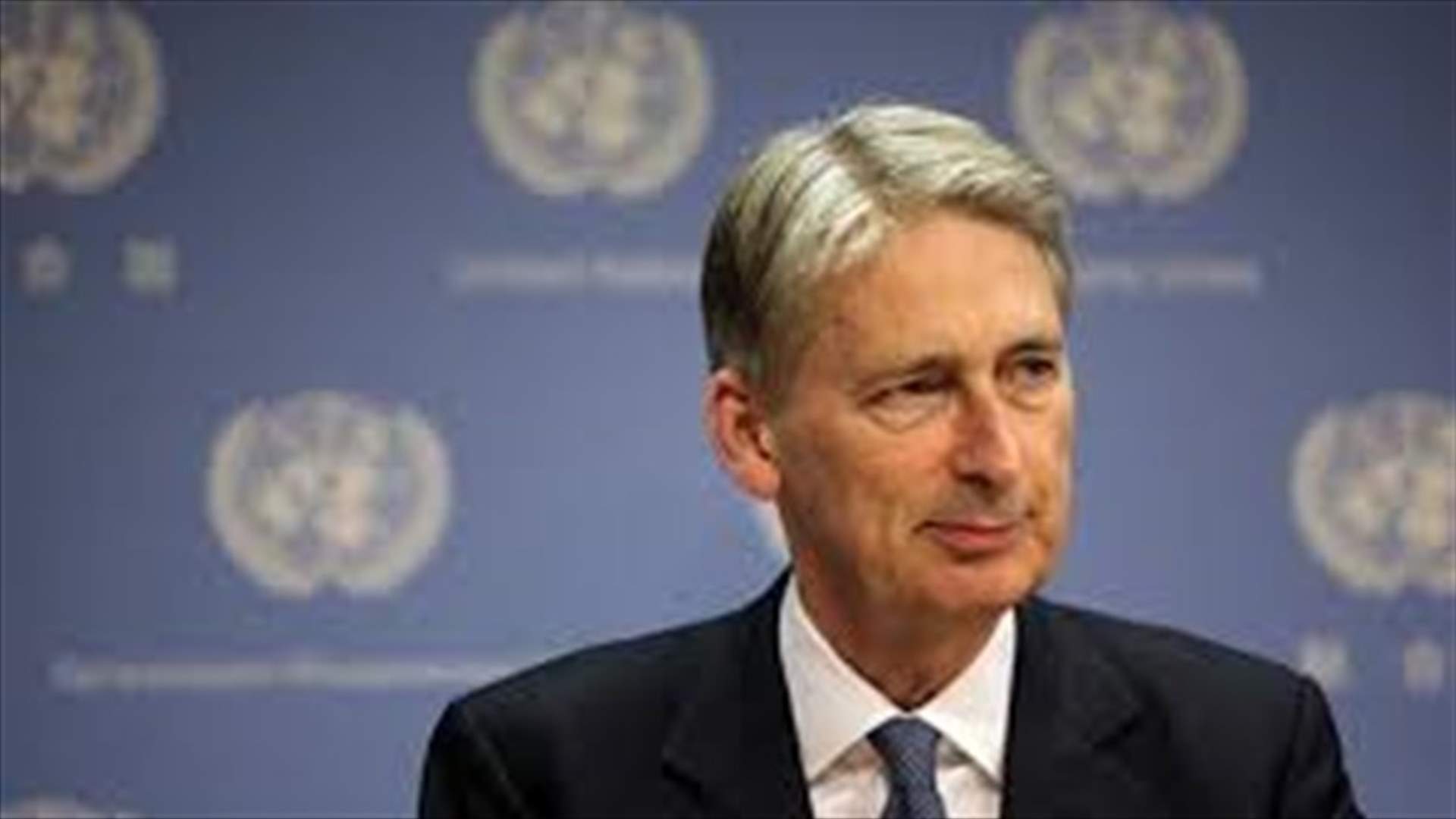 UK`s Hammond: Assad must go but might need to talk to him