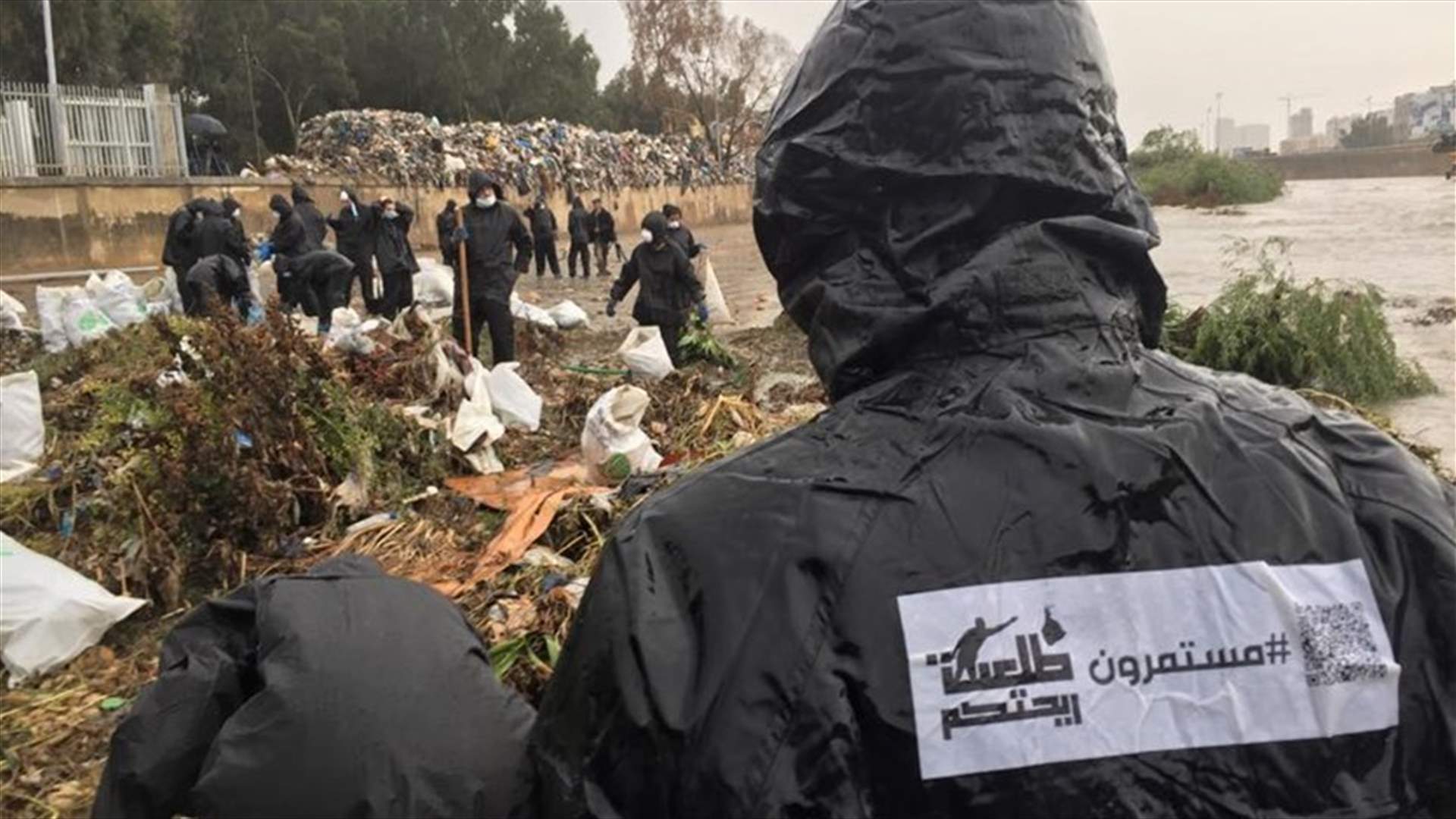 REPORT: You Stink activists remove piled up trash from the Beirut River 