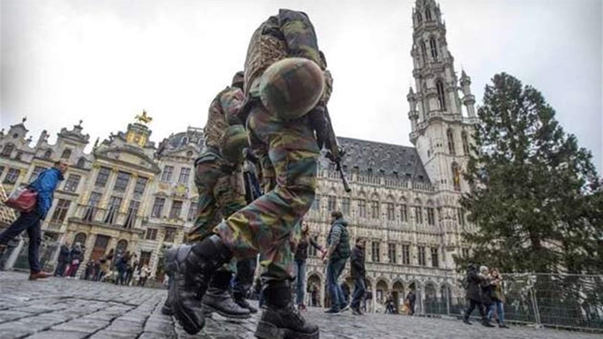 Belgian PM lowers Brussels alert level, says threat still serious  