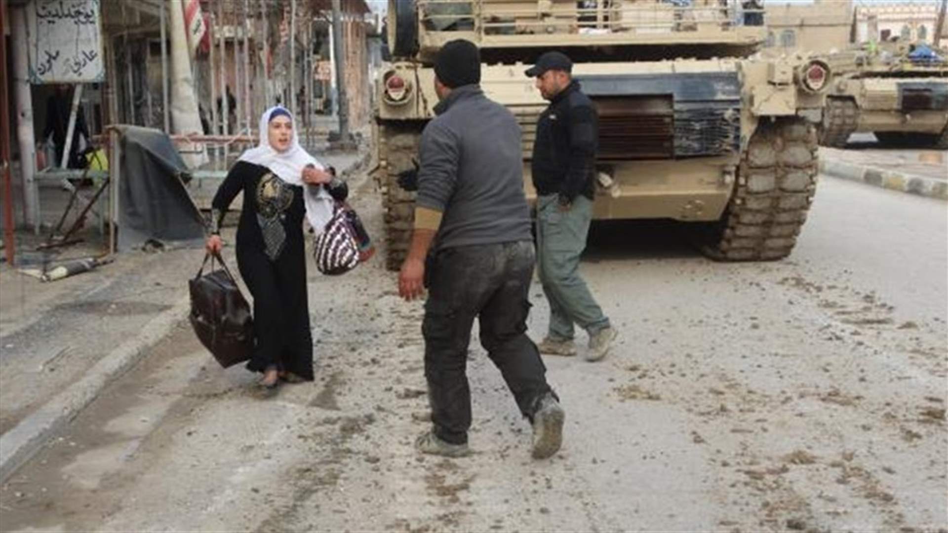 Terrified families emerge from rubble after battle of Ramadi