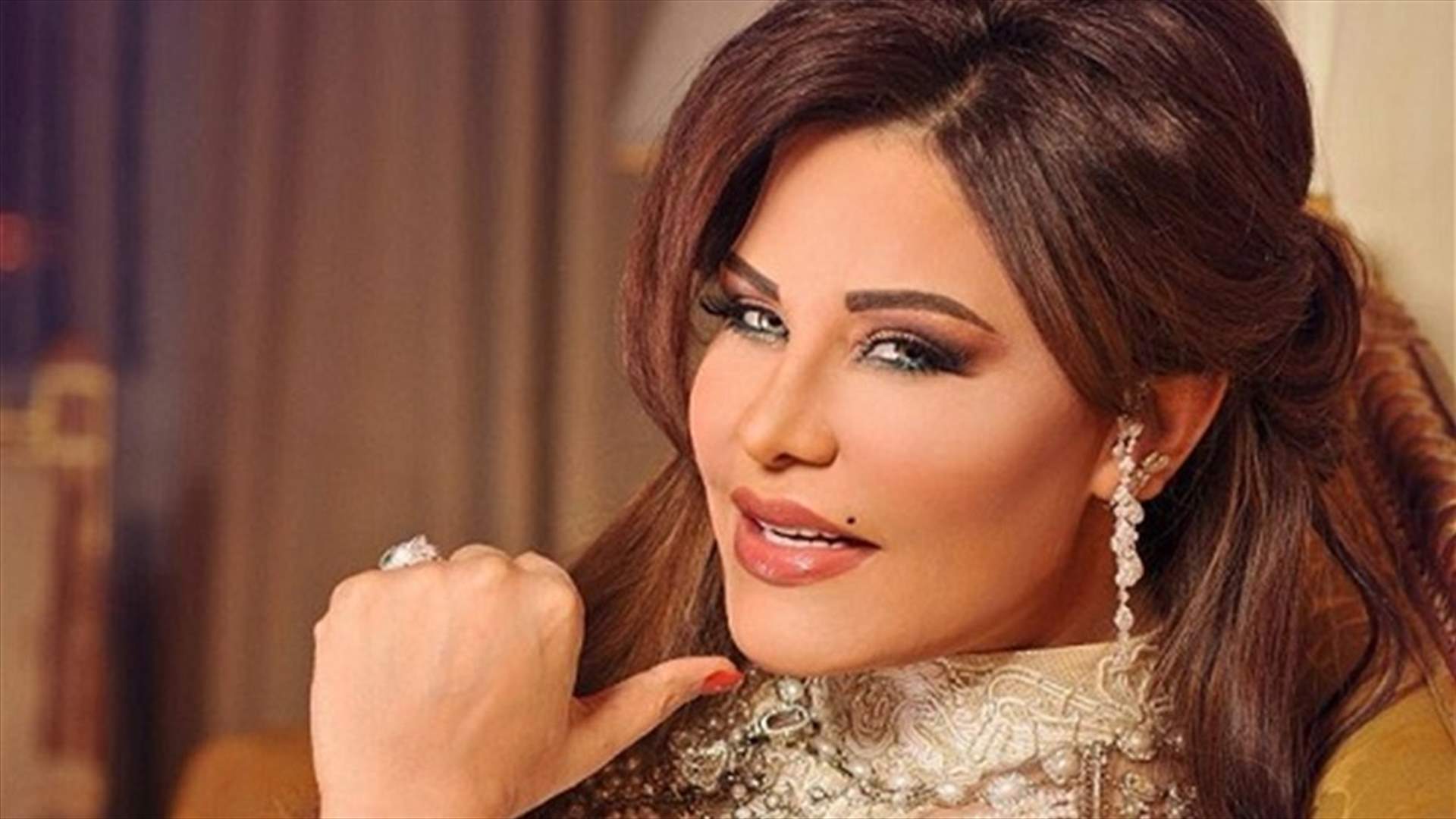 غزل وصور حميمة بين أحلام وزوجها