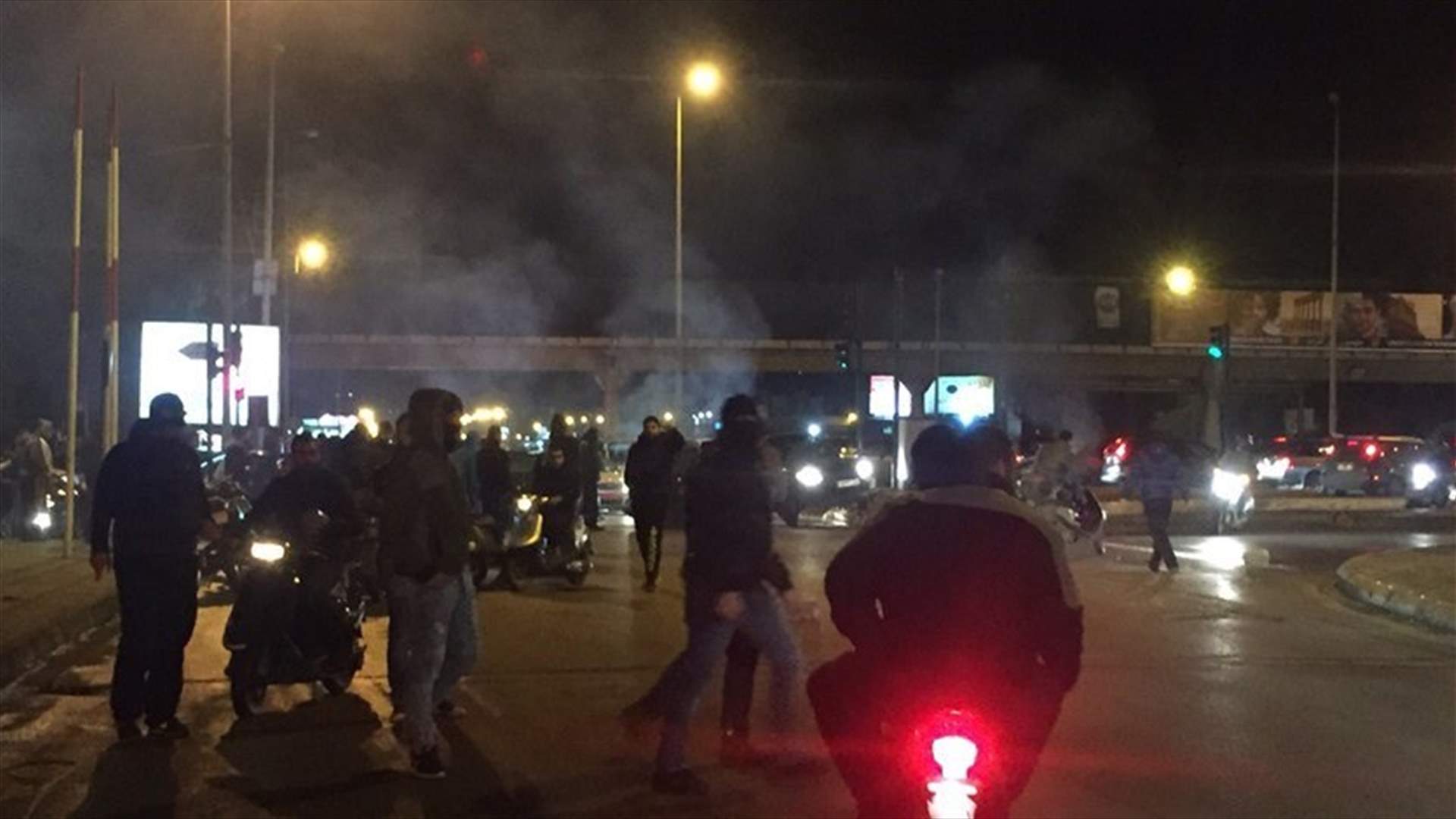 Demonstrators block roads in Beirut to protest against release of former minister