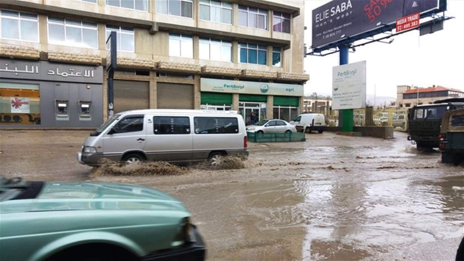 Snow blankets Lebanon mountains, heavy rainfall floods Bekaa roads 