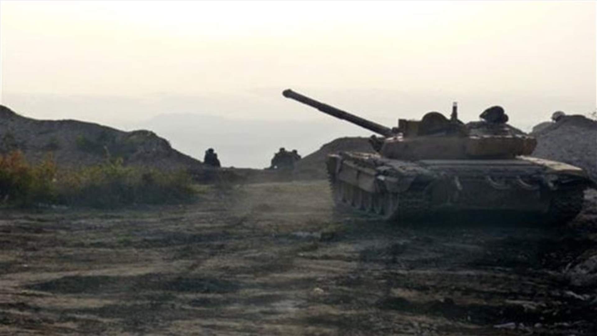 Syrian pro-government forces retake key town in west ahead of planned talks