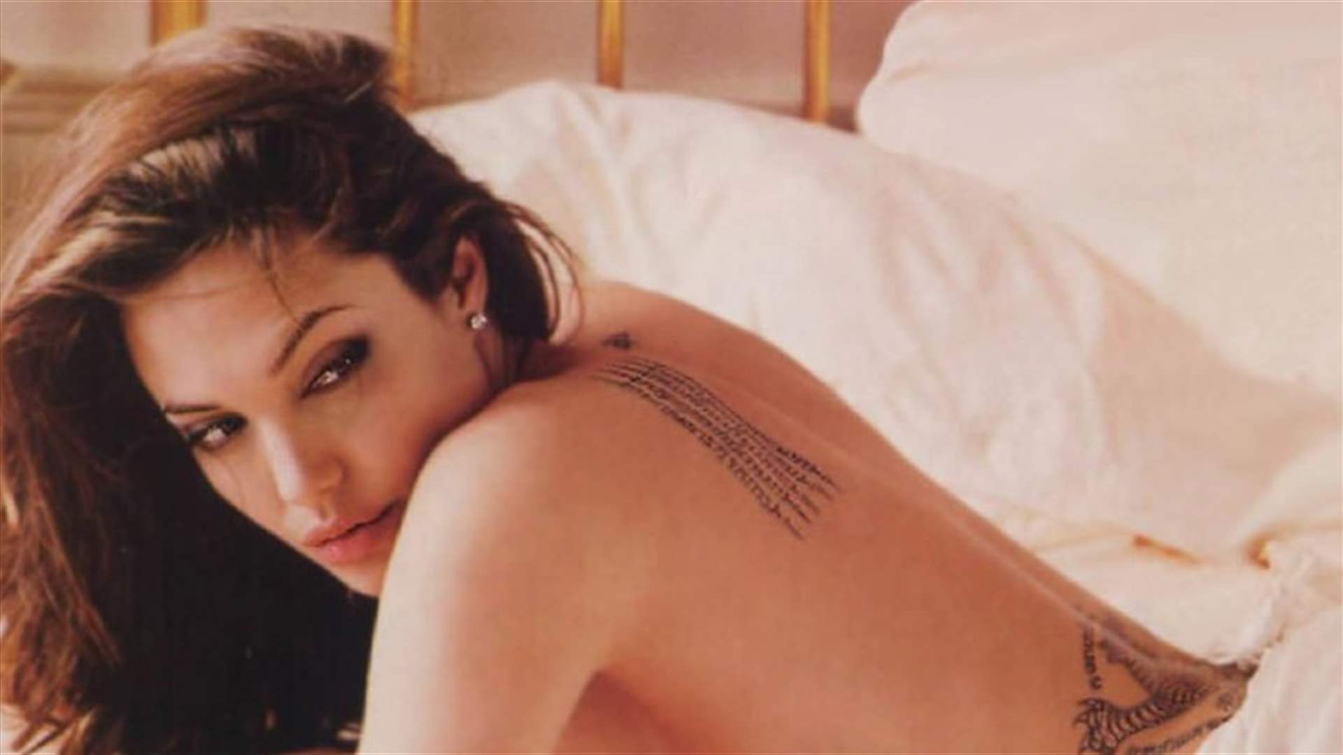 بالصور: وشوم جديدة على جسد أنجلينا جولي