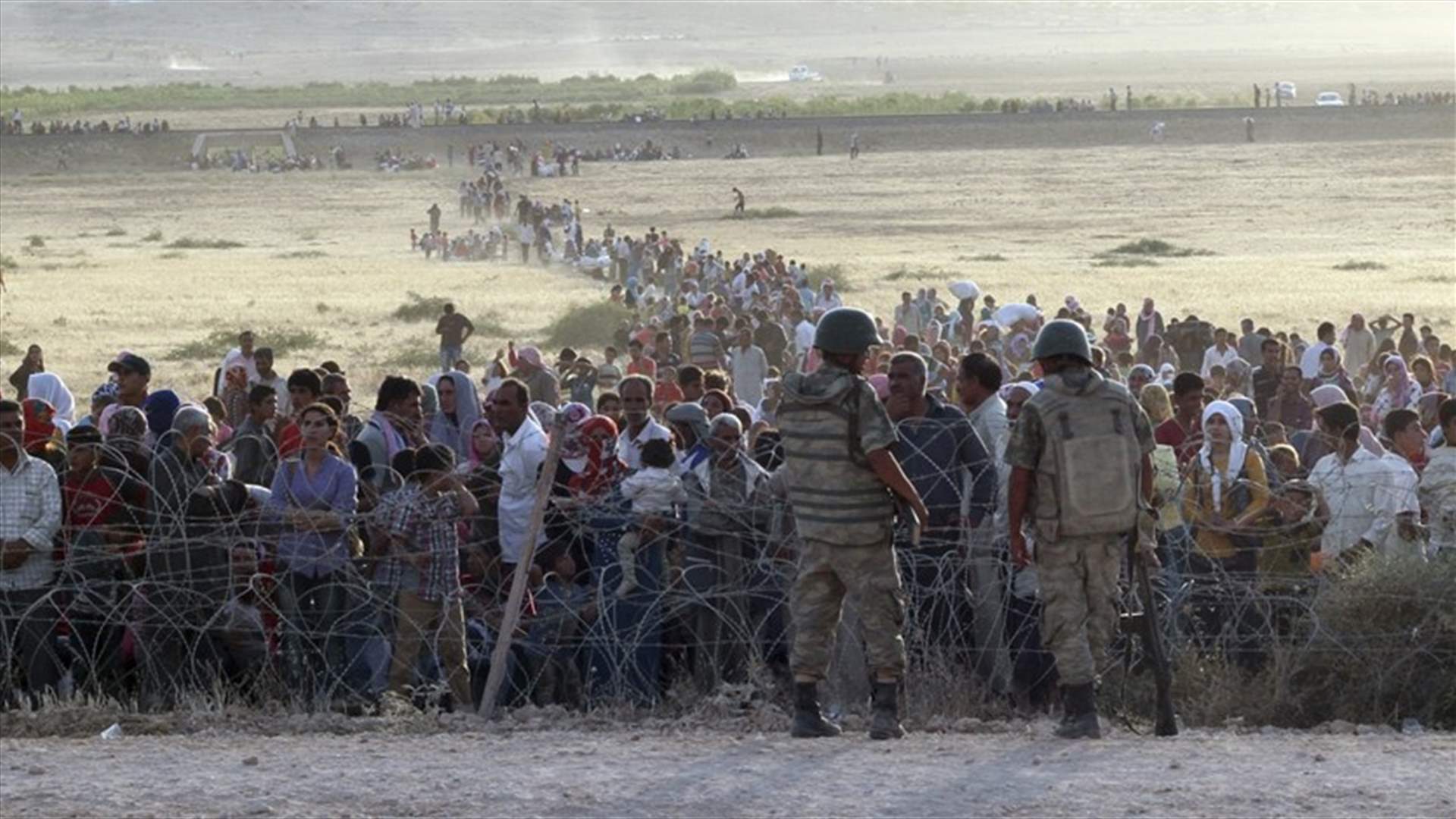 Turkey will take refugees fleeing Syrian forces &#39;when necessary&#39; - PM