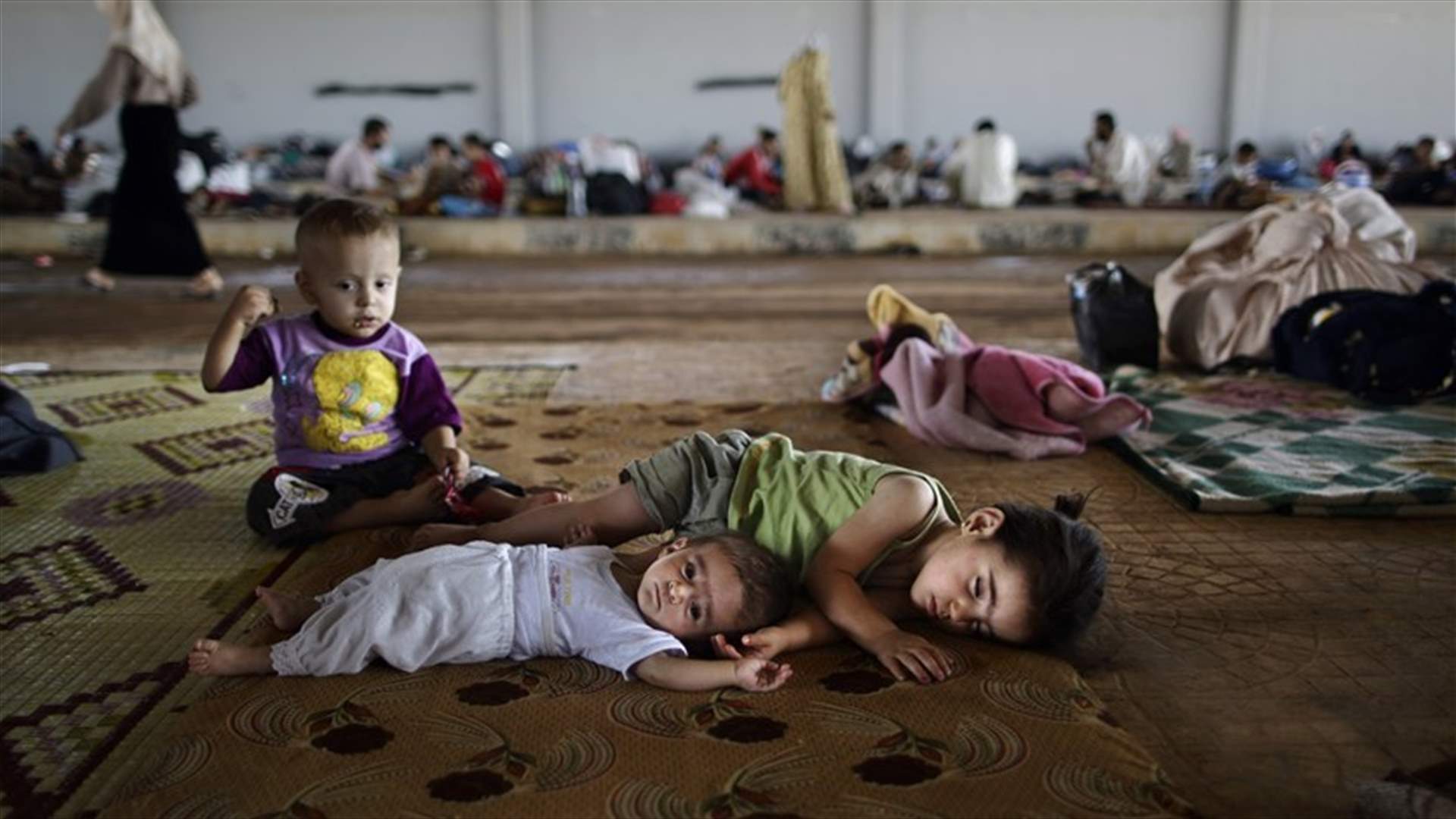 Report paints grim picture of kids' lives in Syria
