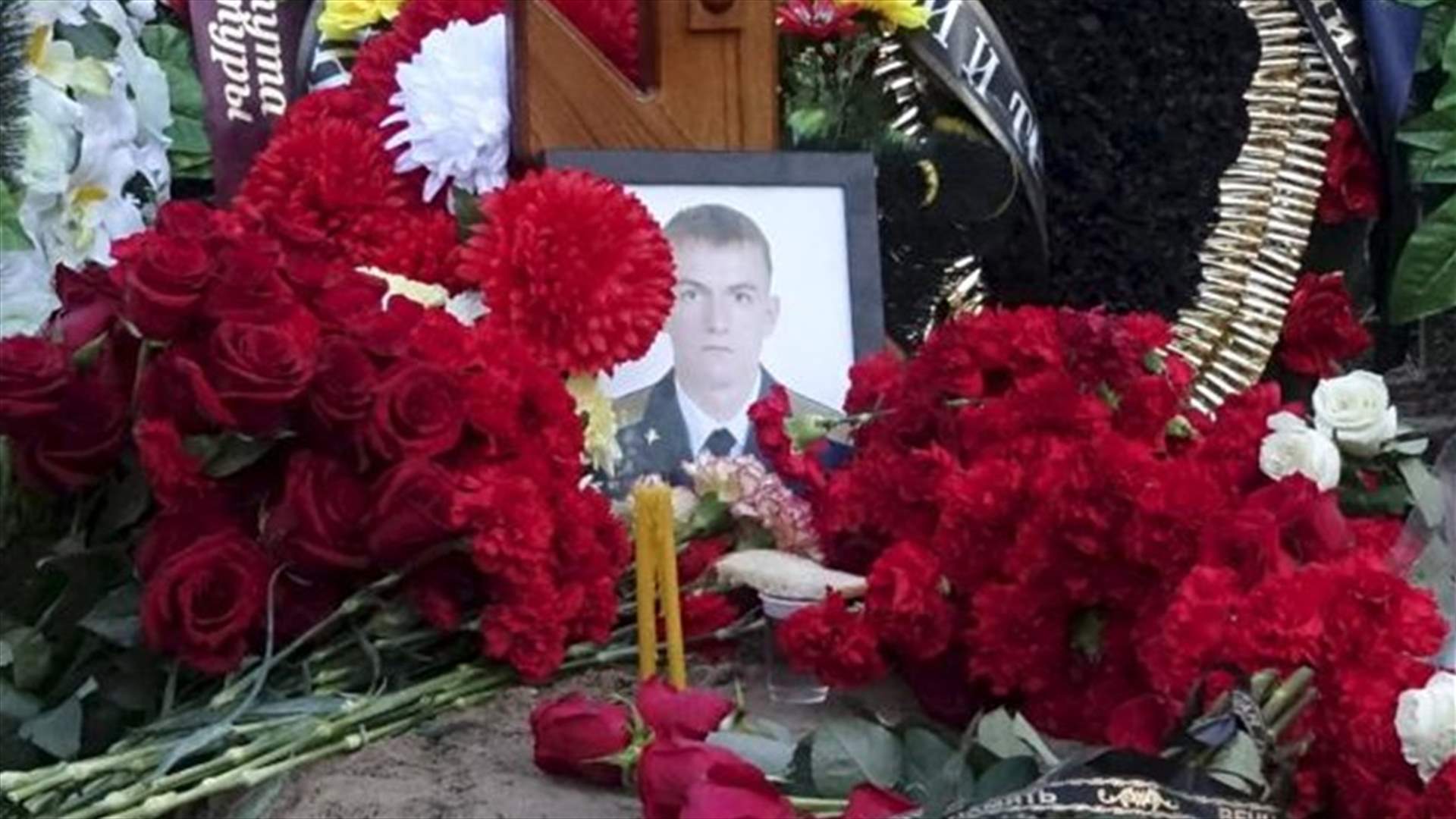 Fallen Russian soldier's family mourns with medal, and questions