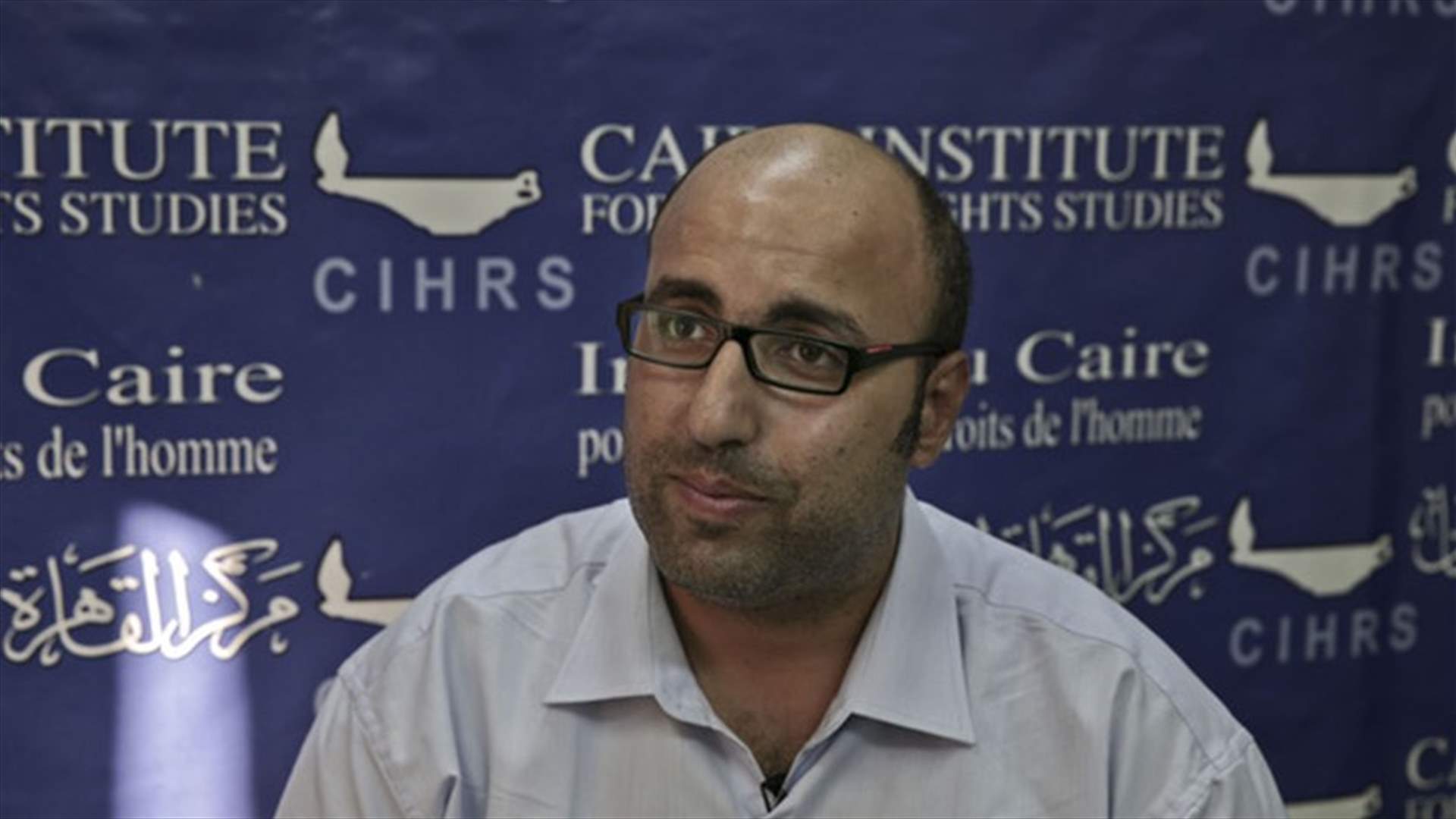 Egypt rights activist says banned from travel