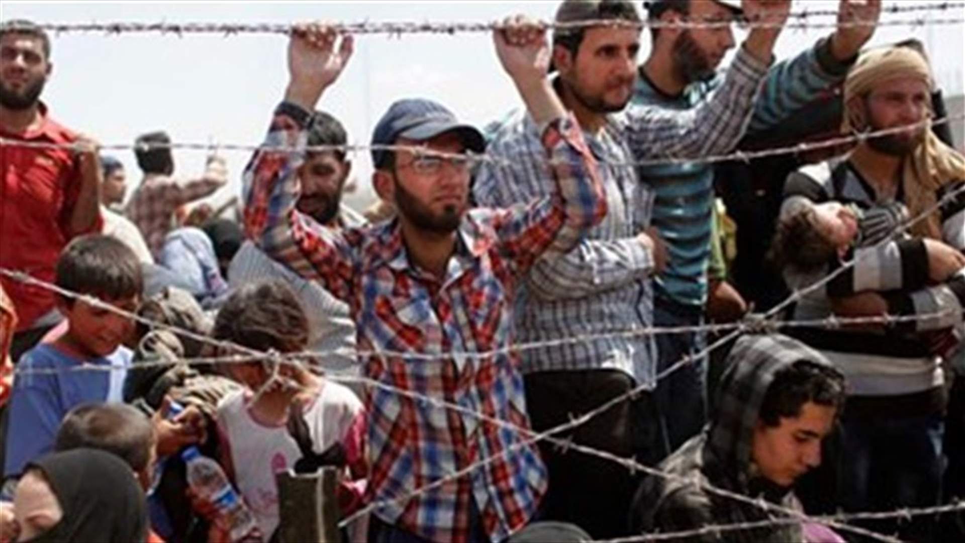 Activists say 8 Syrians killed trying to cross into Turkey
