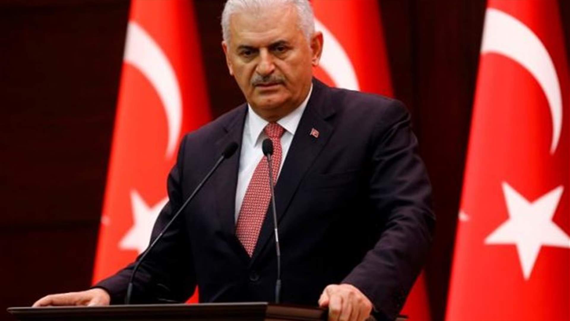 Turkey PM says aims to develop relations with Syria, Iraq