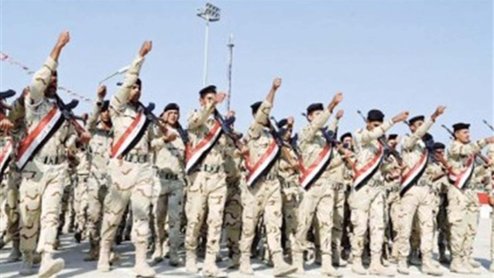 Iraqi armed forces, Shi&#39;ite paramilitary units parade in Baghdad
