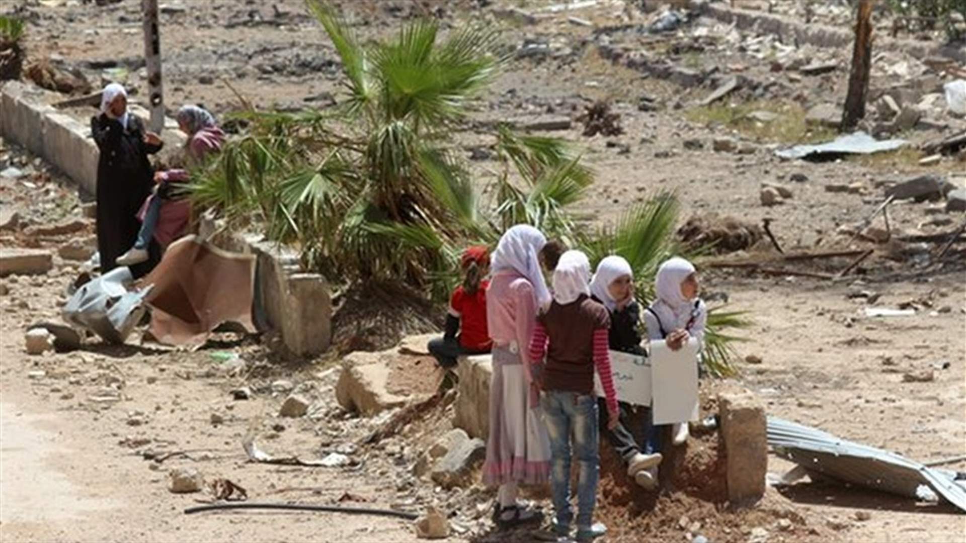 First aid convoy since June enters besieged area in Syria's Homs city - Red Cross
