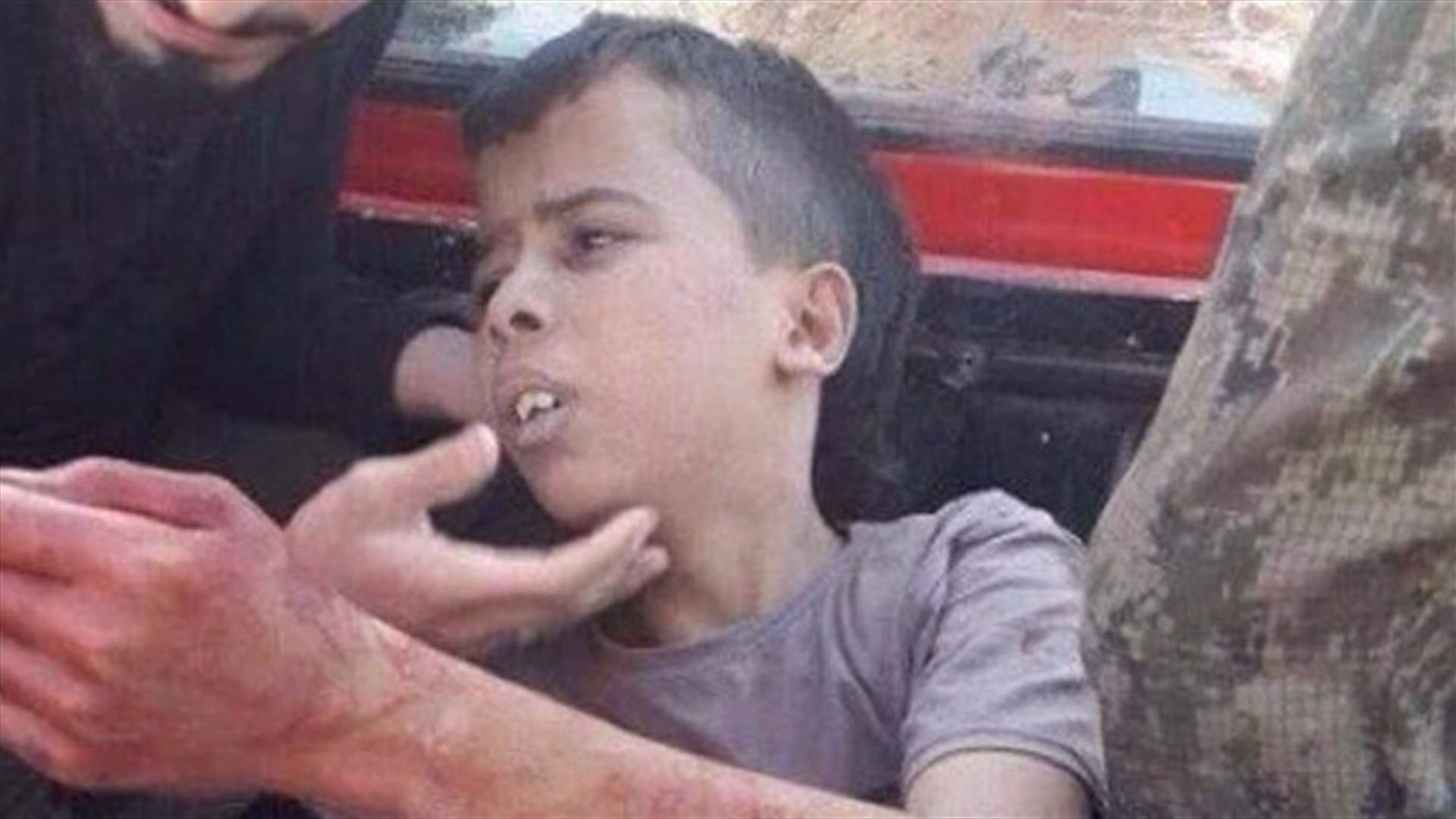 [PHOTOS] Syrian rebel group says investigating child beheading video