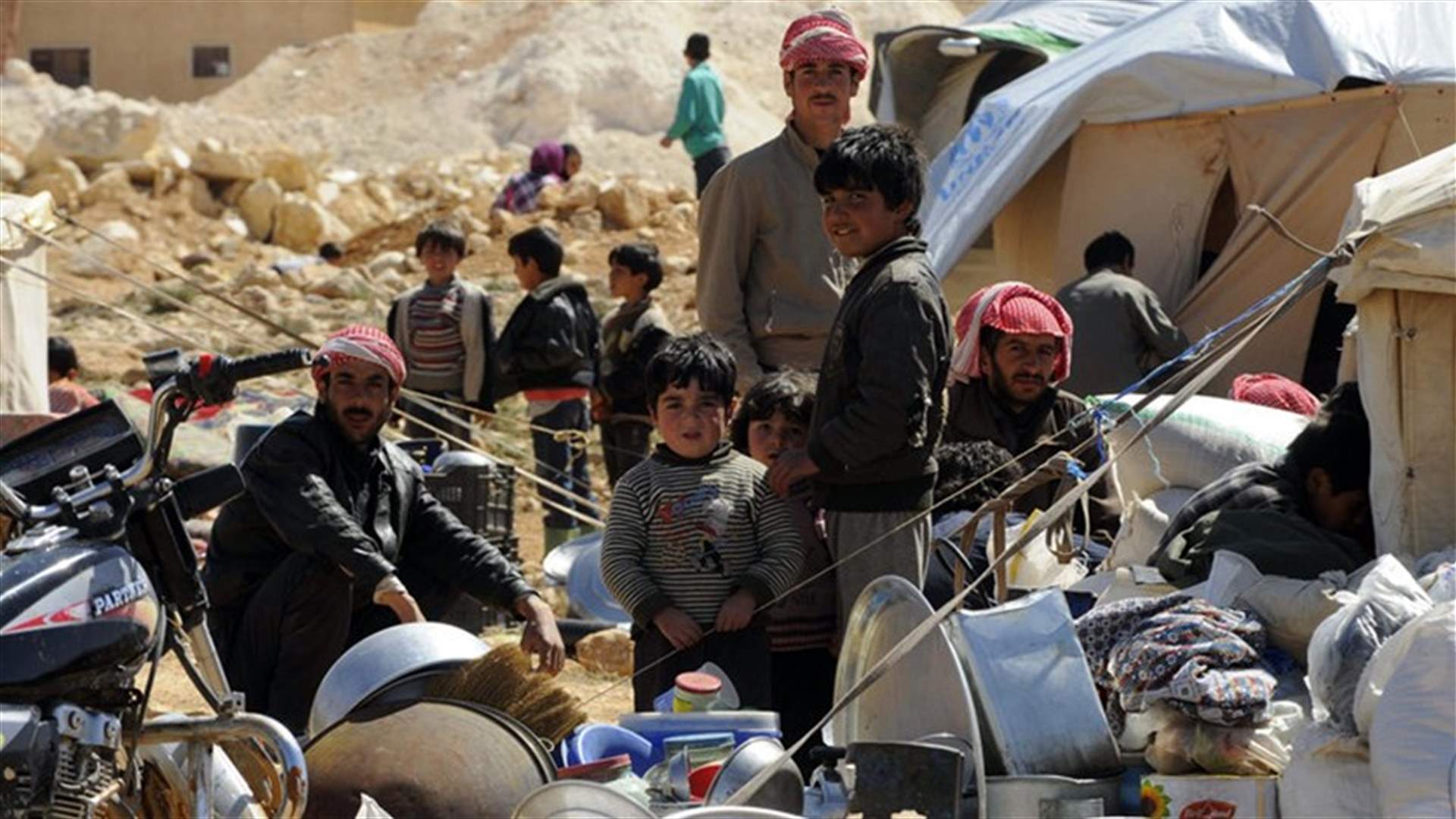 Syrians in Lebanon hit by arrests, curfews and hostility after bombings