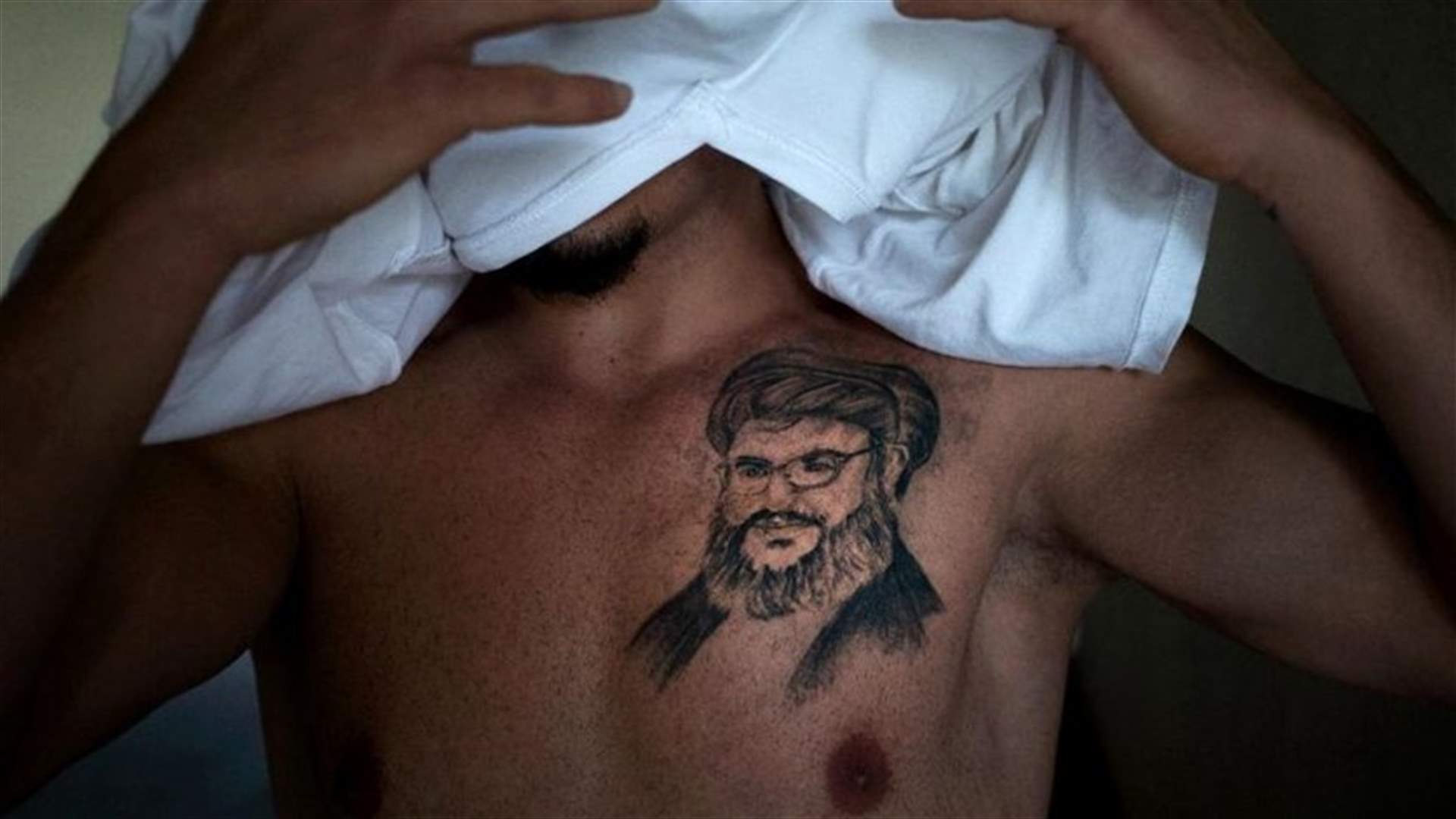 بالصور - عندما ينفرد المسلم بأوشمة دينية لإثبات إنتمائه