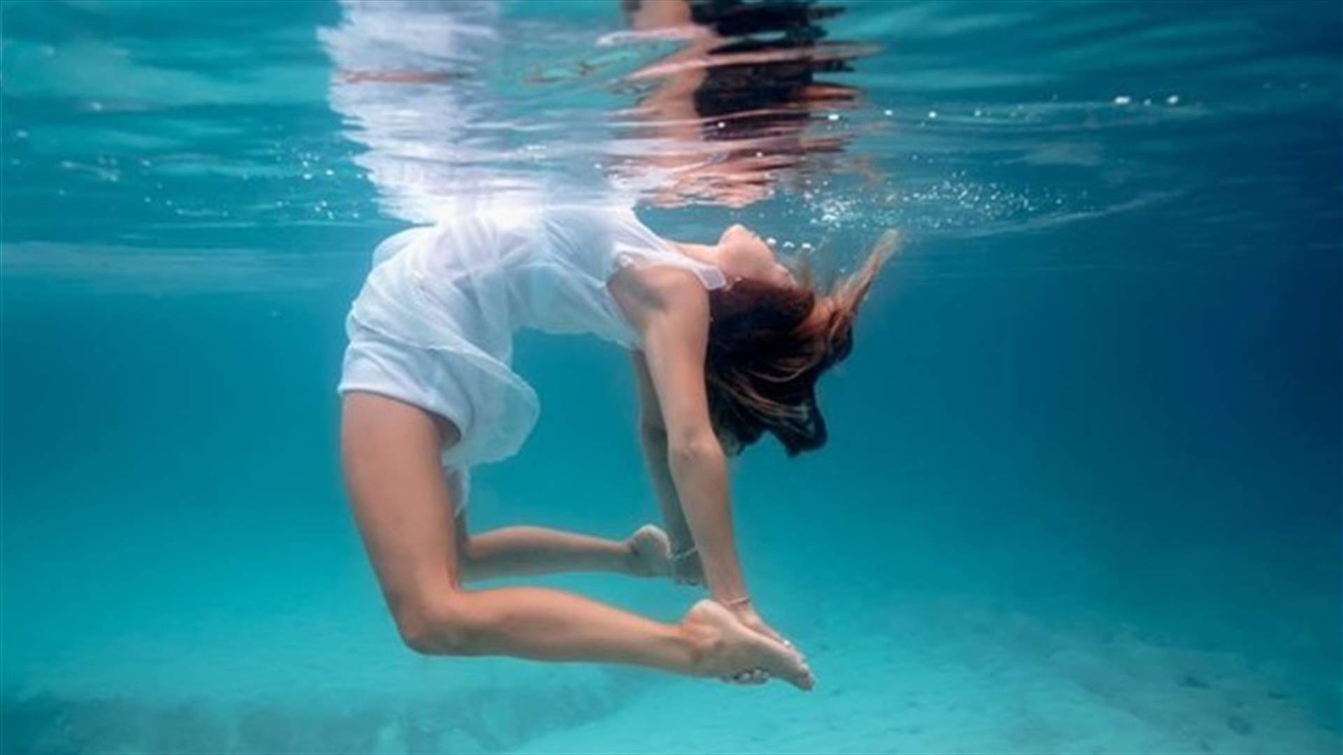 [PHOTOS] These Underwater Yoga Photos Prove The Practice Is Actually Magical