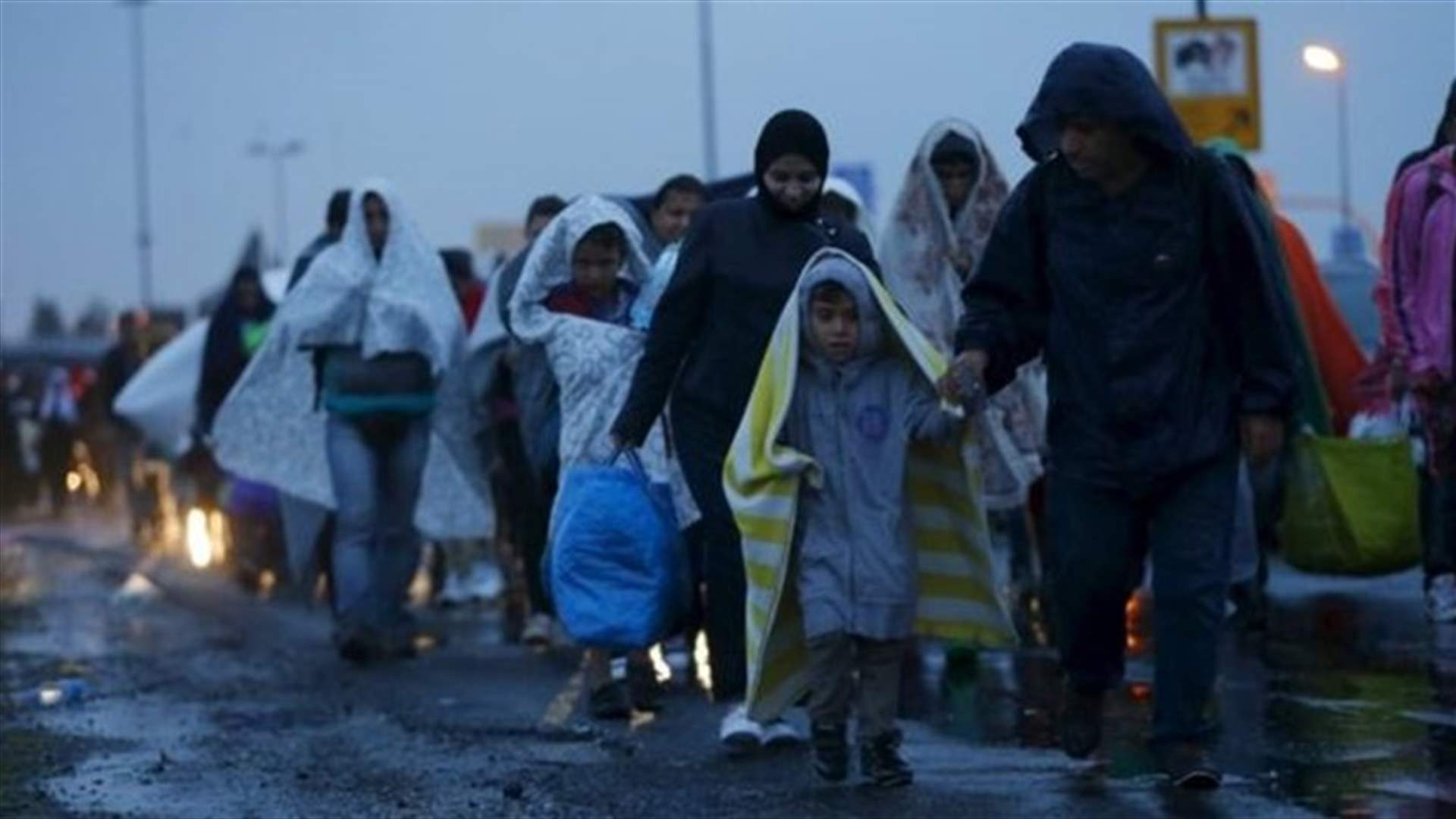 Austria threatens to sue Hungary over migrants