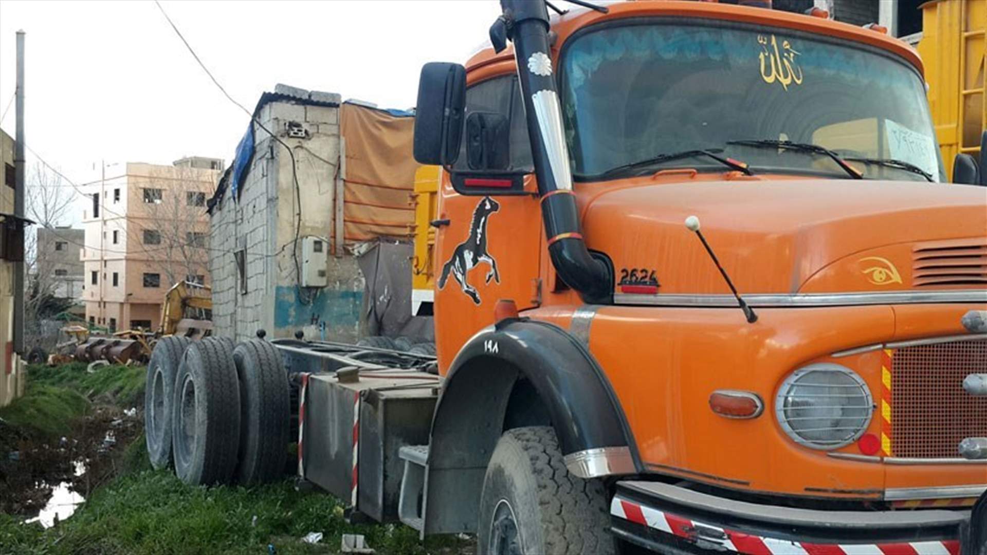 Worker killed after tire of a concrete mixer truck explodes in Kfartebnit