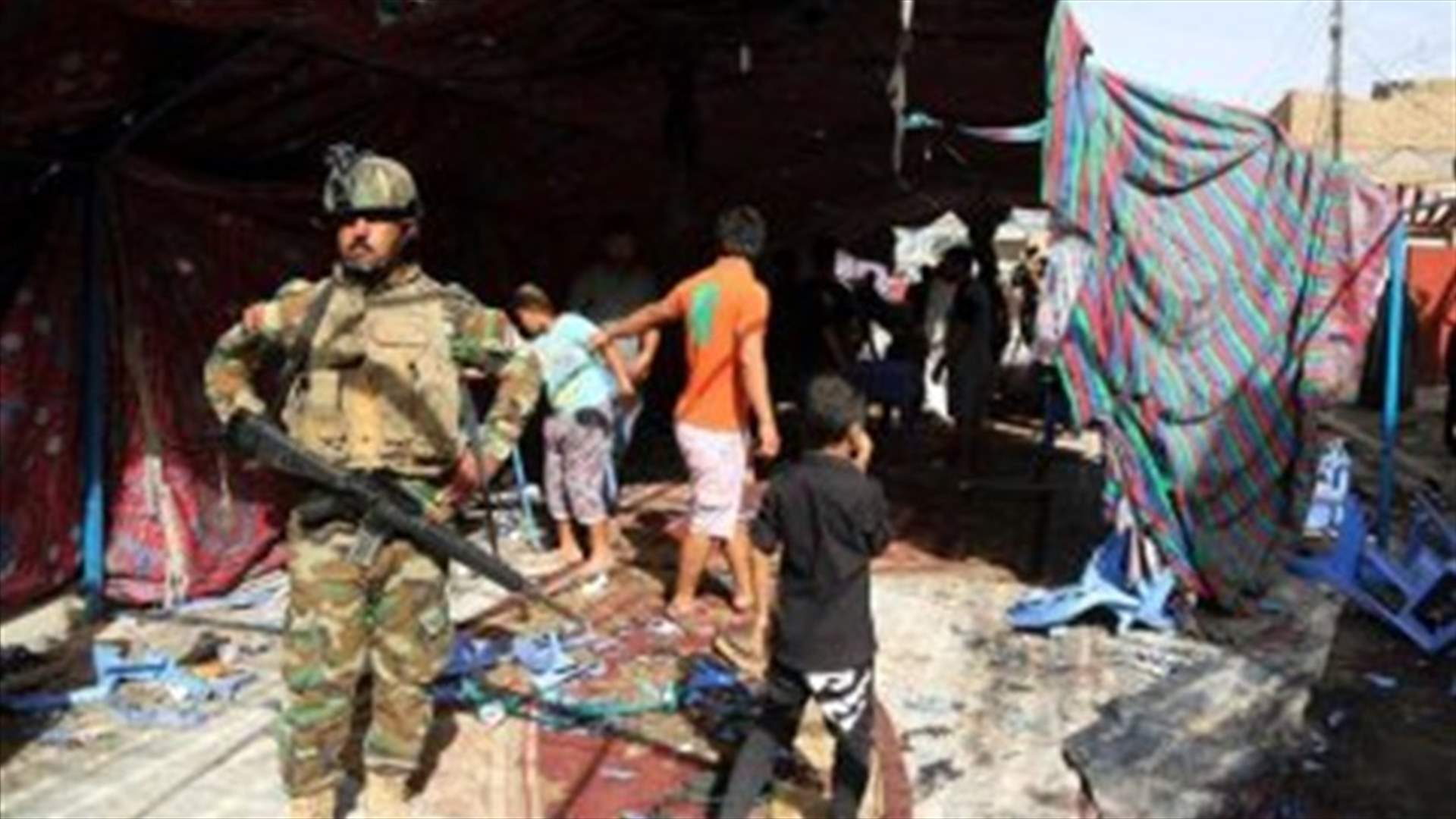 Suicide bombing kills 10 at security checkpoint south of Baghdad   