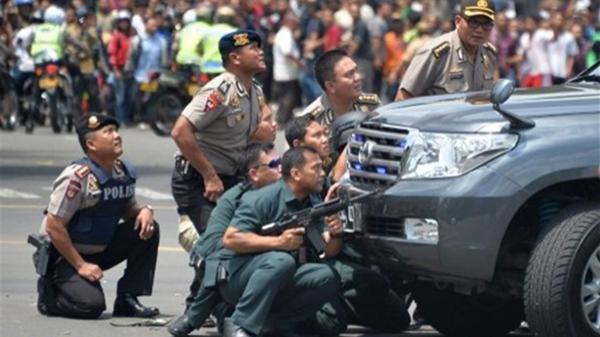 Suspected IS-inspired militant stabs three Indonesian policemen
