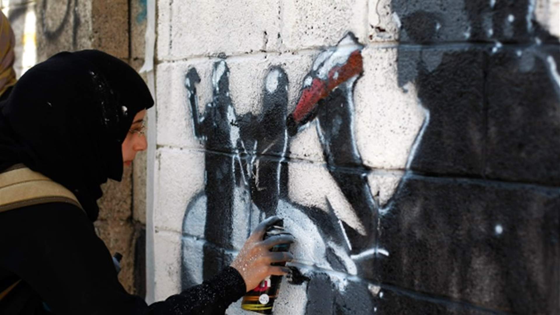 Yemeni graffiti artists hope images will highlight war horrors