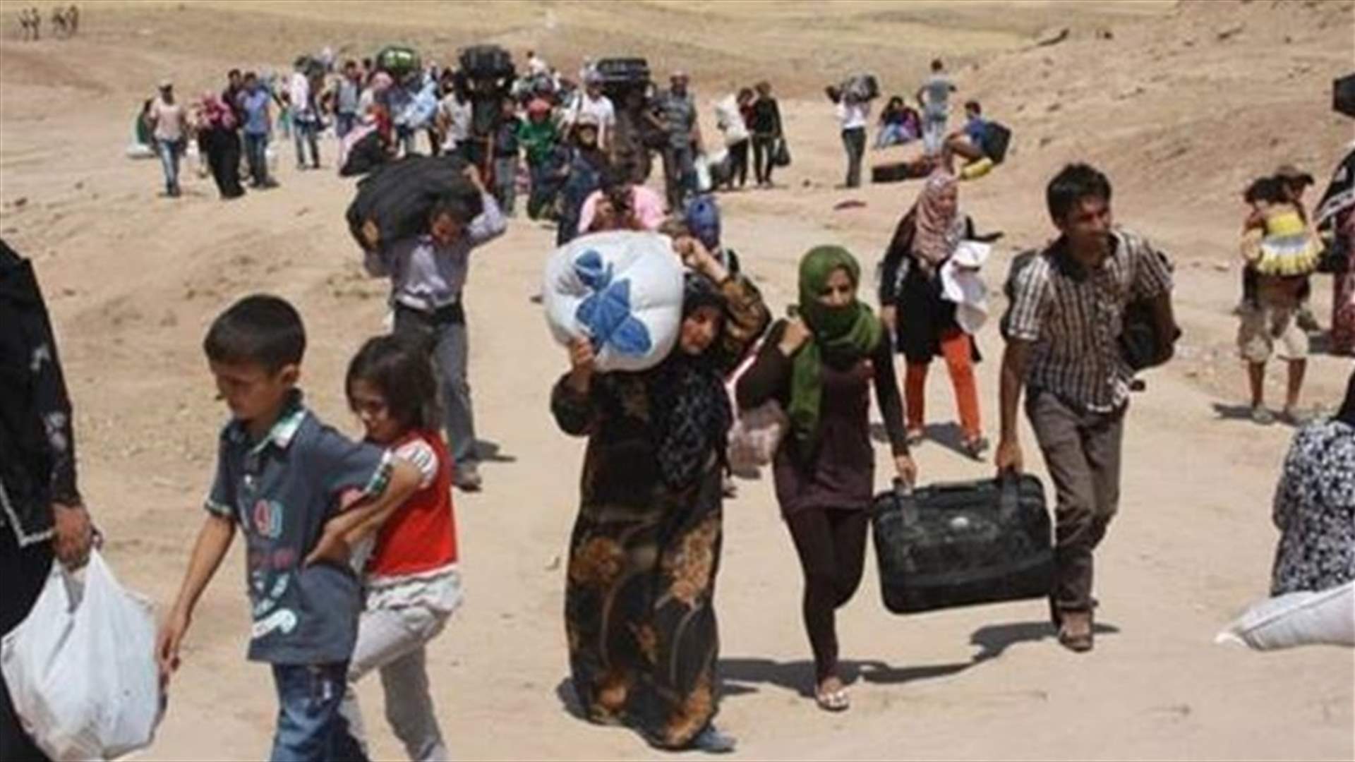18 قتيلا في انفجار قنبلتين في قافلة للنازحين بالعراق