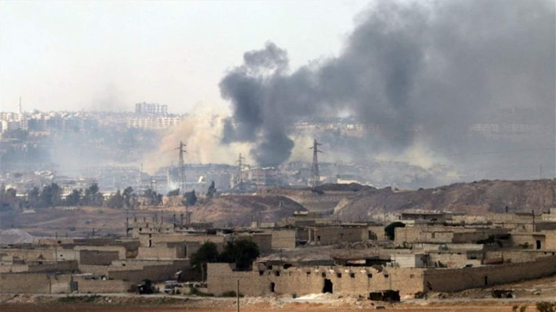 Syrian government battles rebels for key Aleppo district