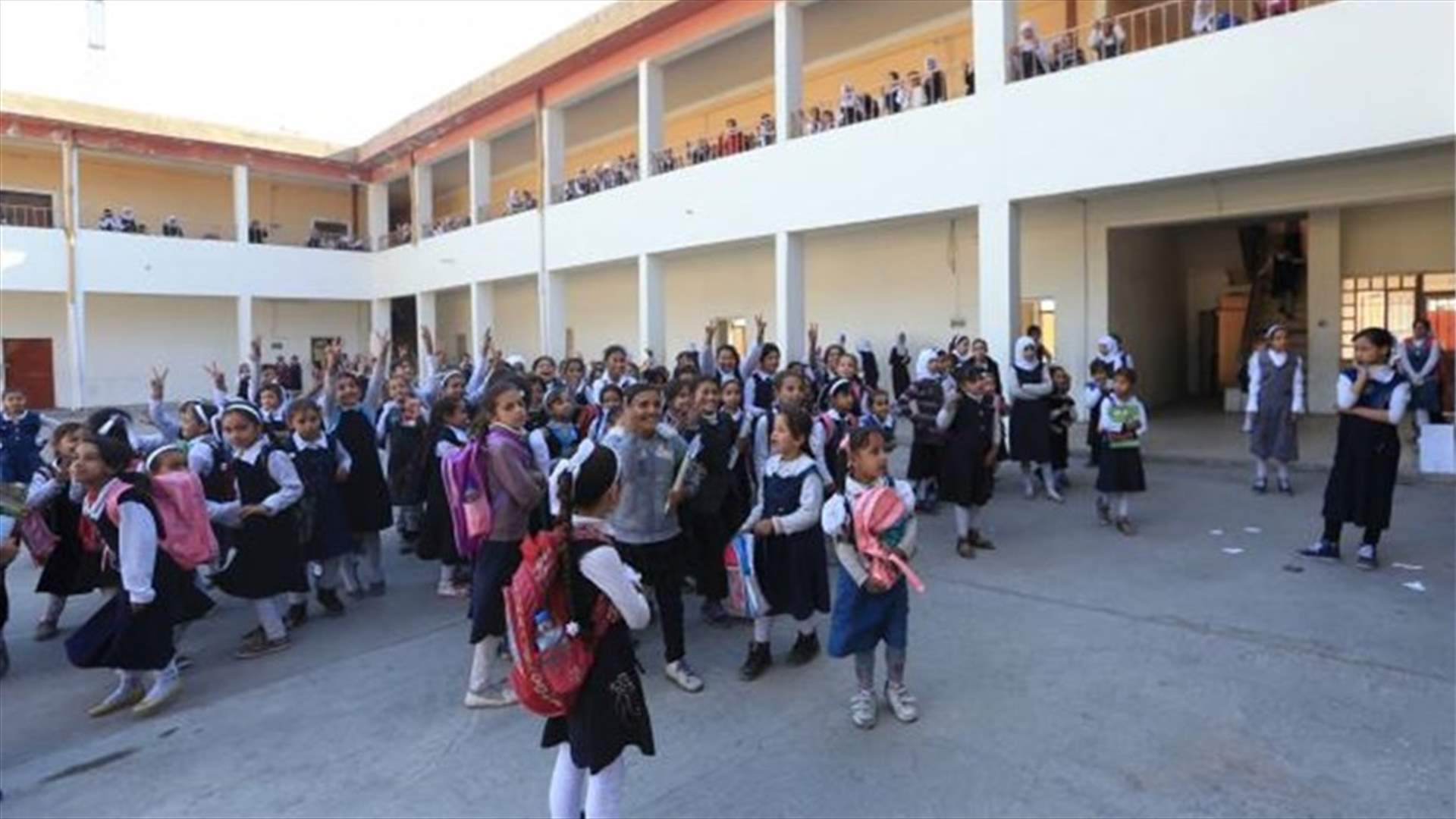 Iraqi children dump Islamic State's books of violence