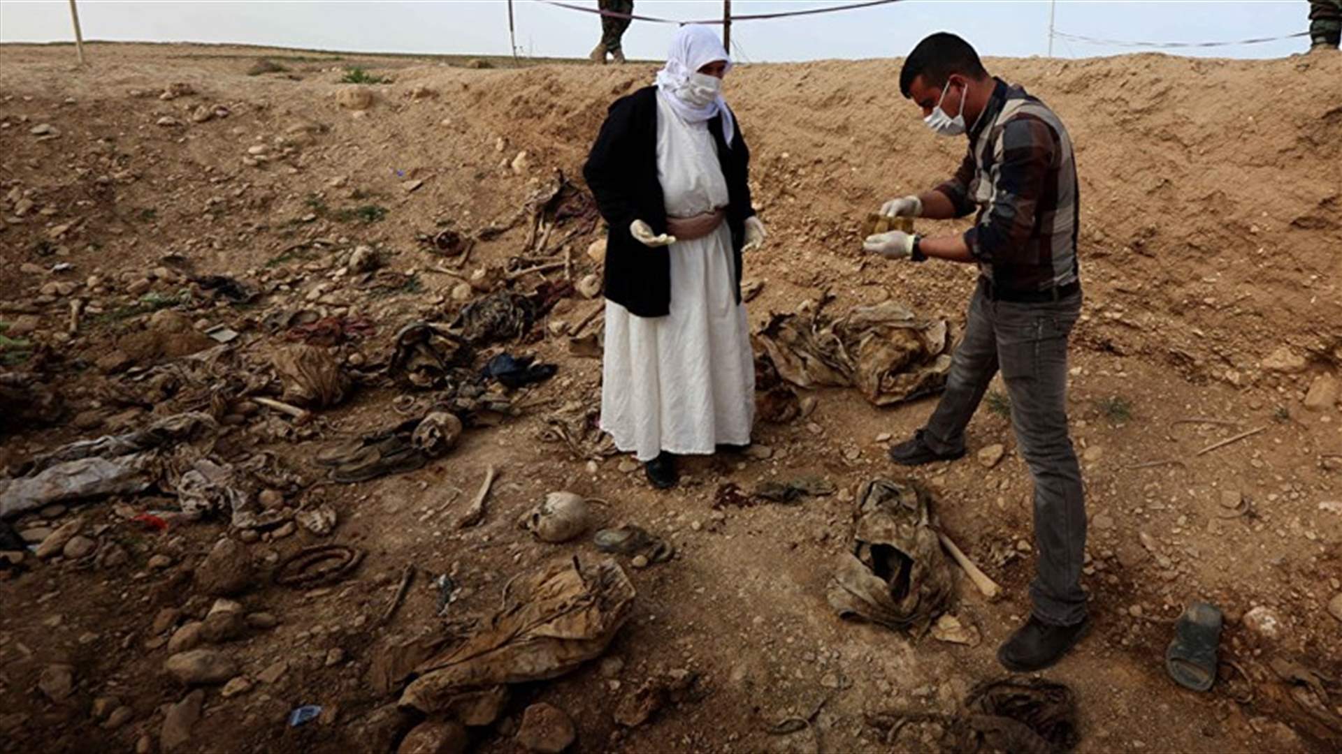 Two mass graves of Iraq&#39;s Yazidi minority found near Mosul -official